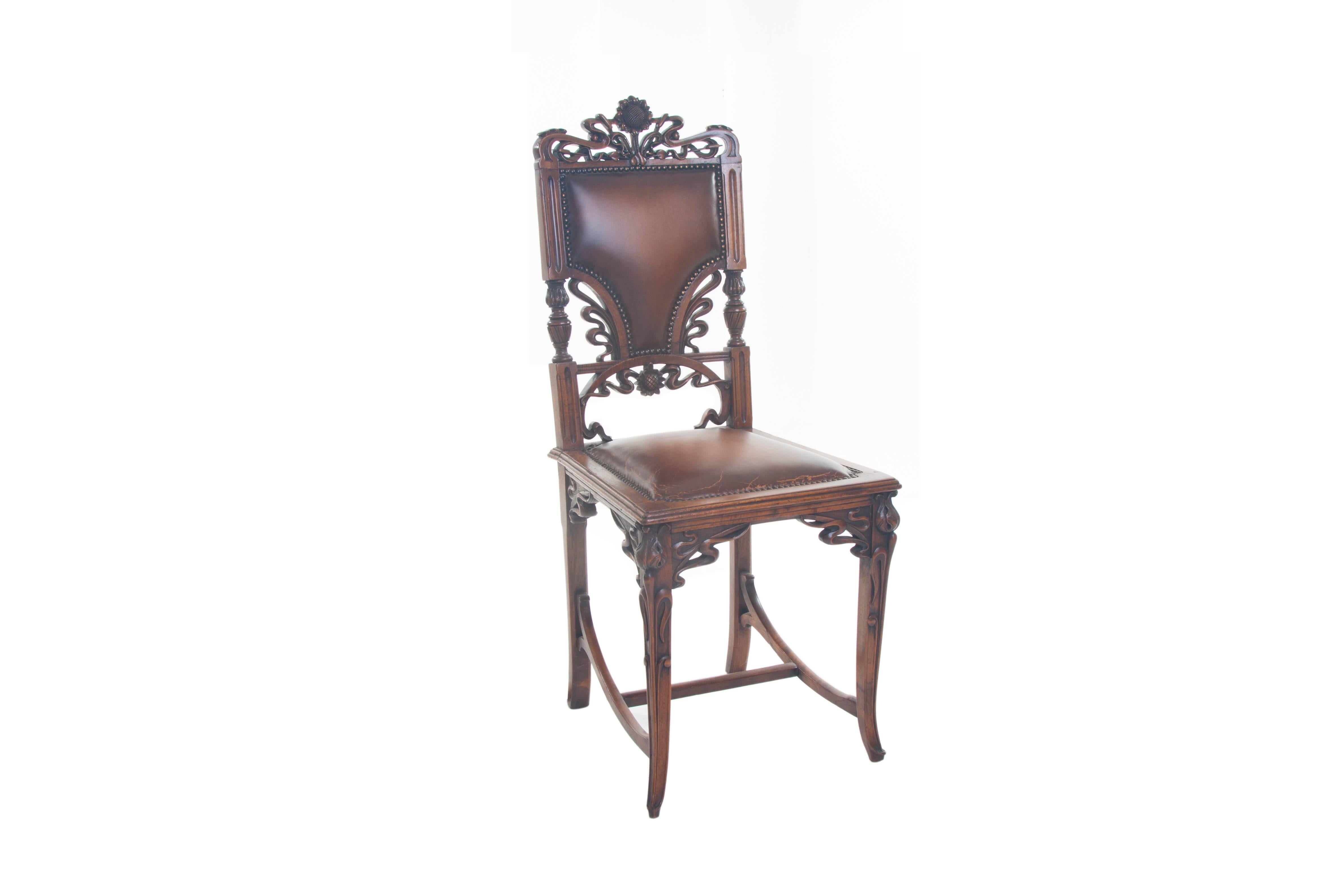 Magnificent "Liberty Chair", Italian, circa 1912. Organic floral motifs. Fully restored with new 'aged patina' leather upholstery.