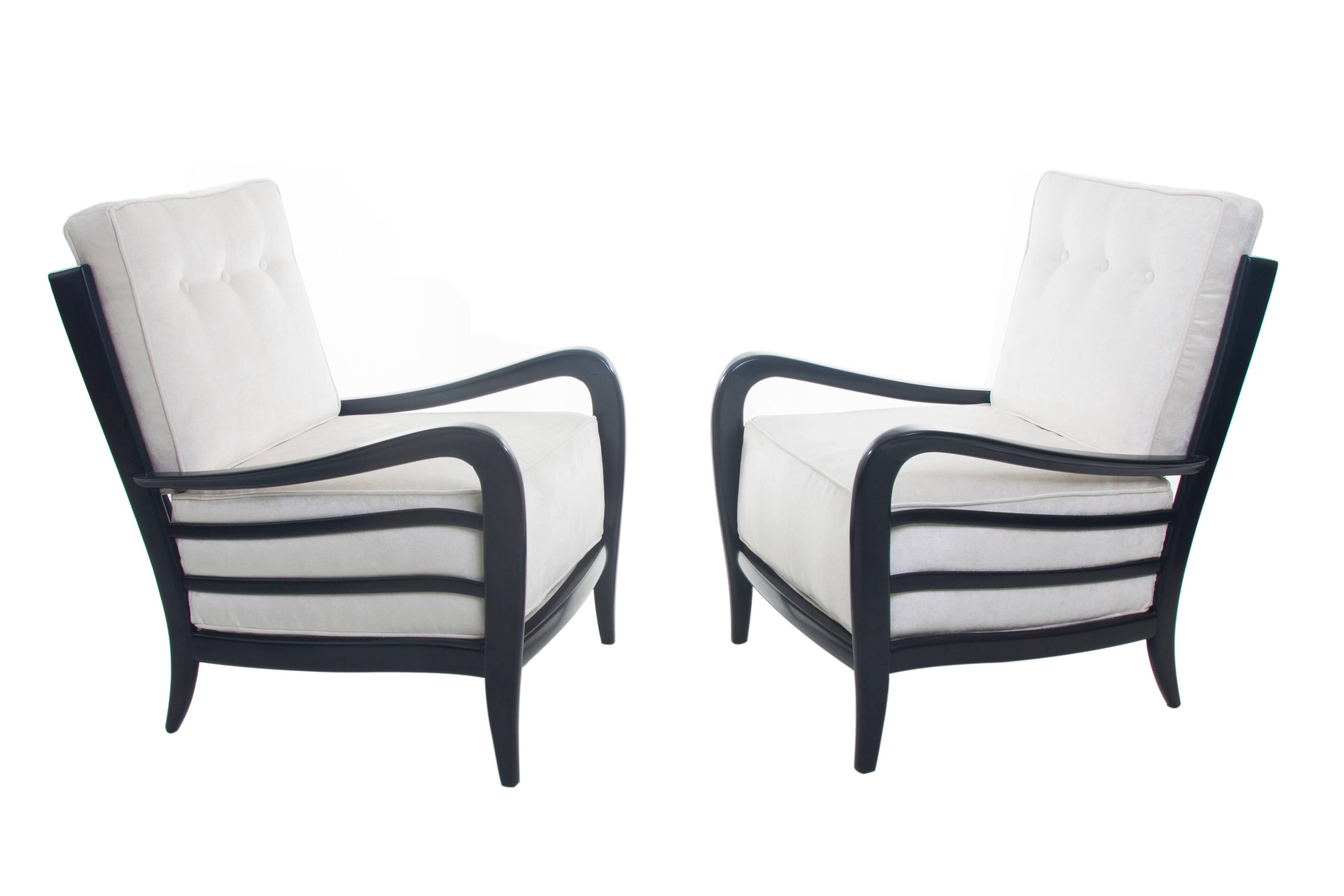 Wonderful pair of black lacquered Lounge Chairs, Italy circa 1950. Restored with new triple-button back Ivory velvet upholstery. These lounge chairs are in exceptional condition. 