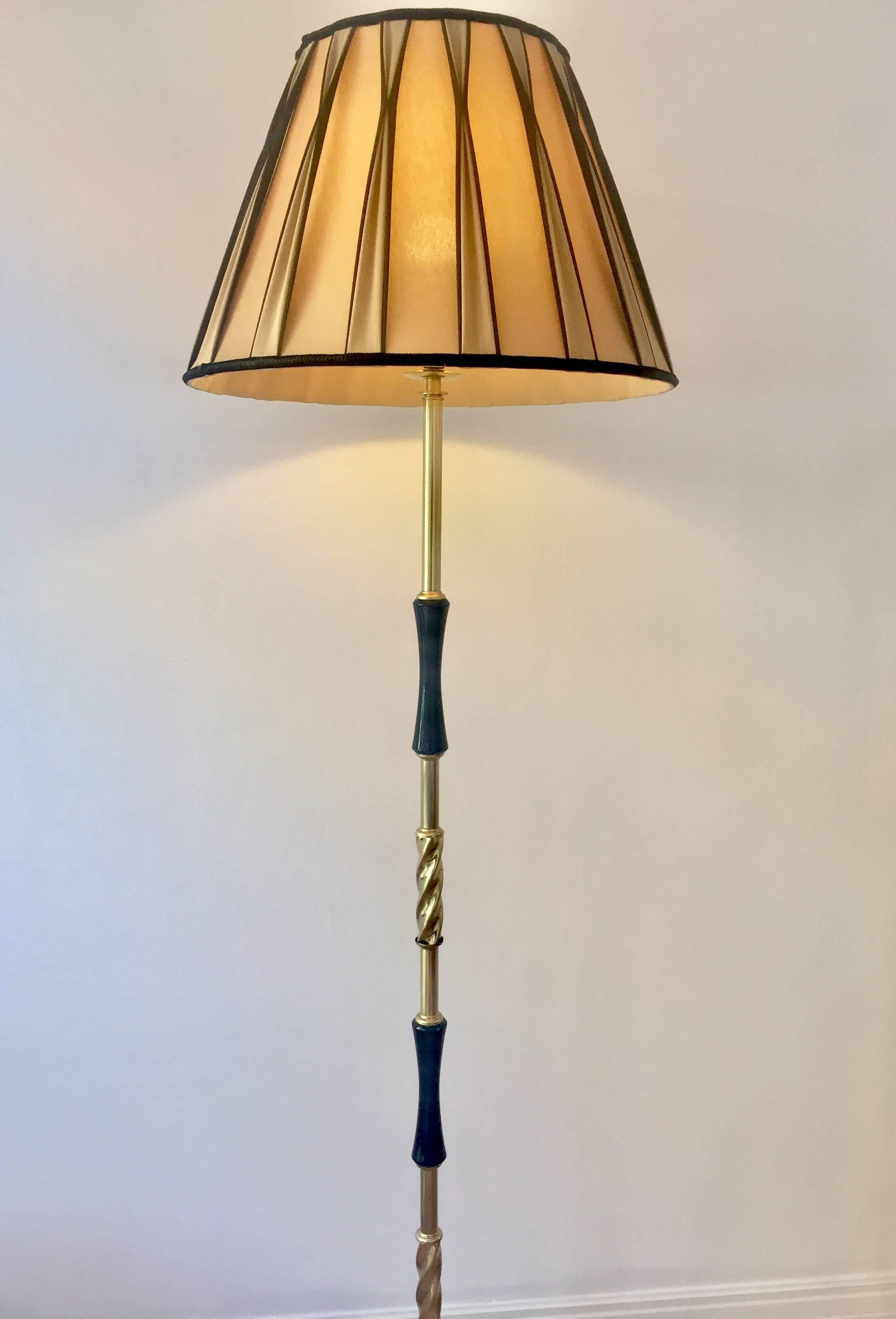 Stylish Mid-Century, Italian Barley twist brass and ebonized wood floor lamp. The marble base is original in a subtle mustard tone,rewired for Australian use with new high quality Crompton's shade and ready to grace any room in your house.