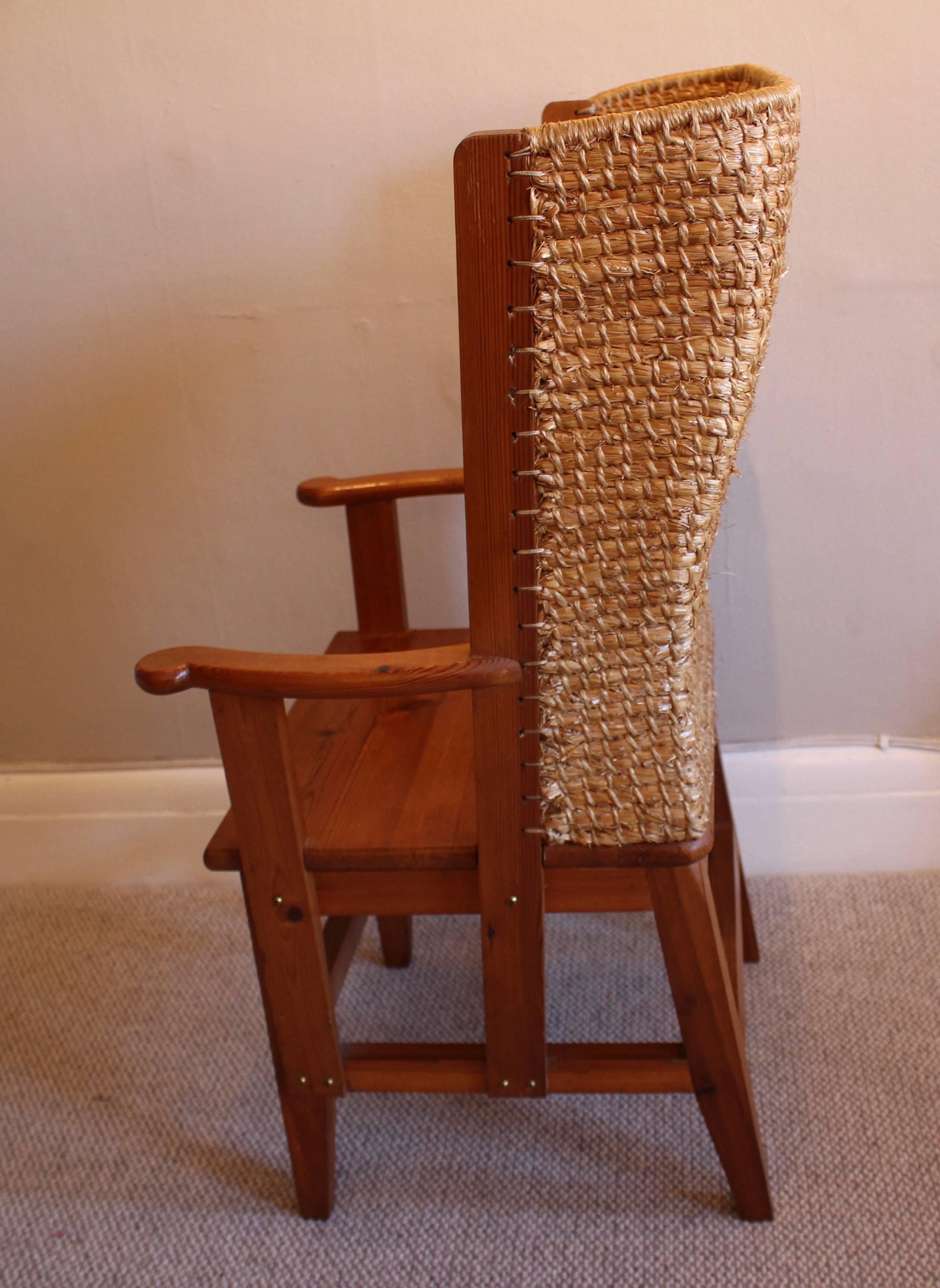 A delightful Orkney Chair. In good condition and although of smaller proportions it's large enough for an average to smaller size adult. Orkney chair from Scotland made of pine and straw to protect the one from the harsh North Sea winds