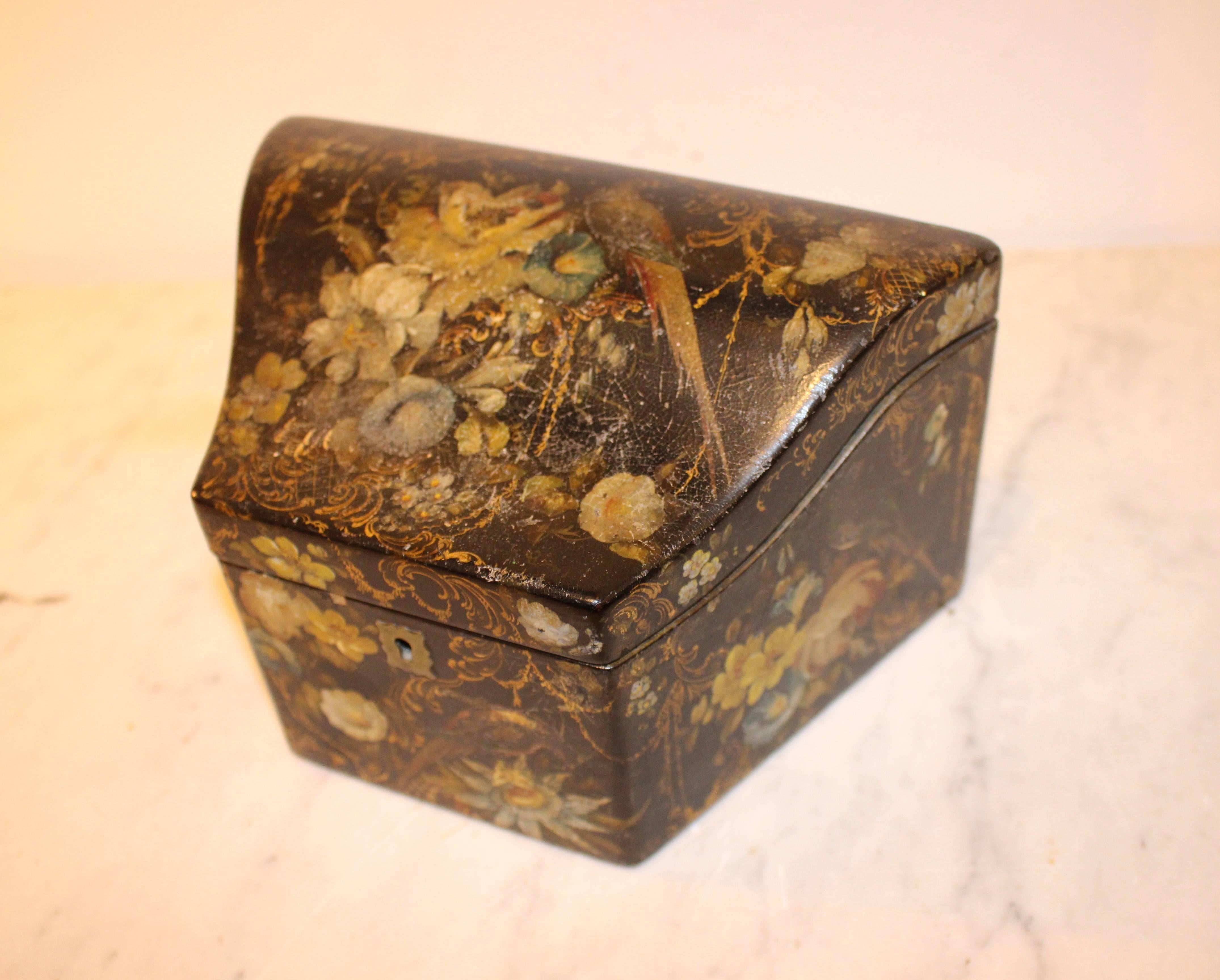 A most beautiful Victorian Papier-Mache Stationary Box with painted and gilded birds and flowers. Rising serpentine lid lifts to reveal slotted stationary compartments. Beautifully painted decoration applied to sides and lid. 