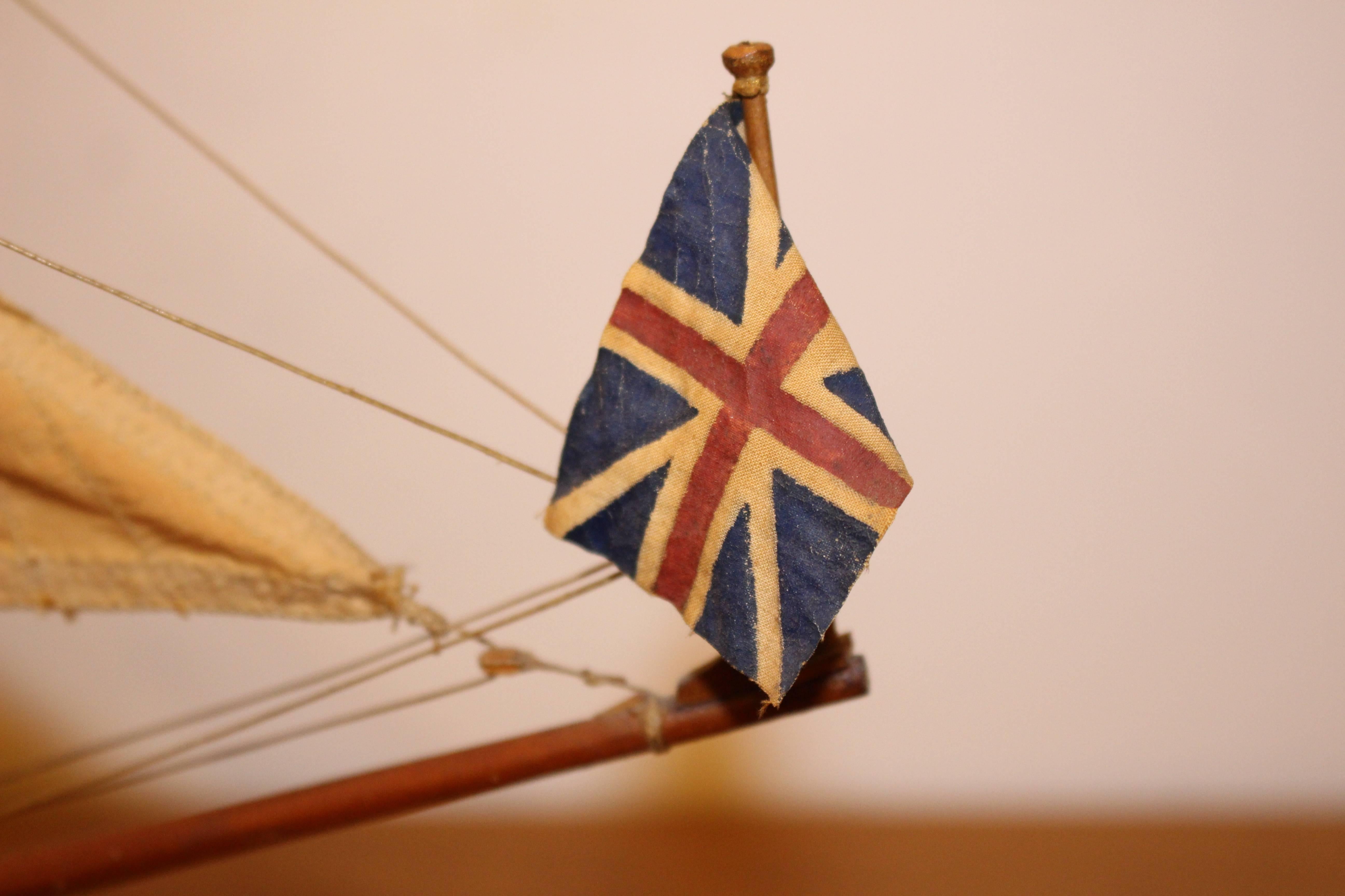 A very fine model of The Stuart Royal Yacht of circa 1674 in a wooden glazed display cabinet.  Made in the scale of 1 inch to 10 feet. Beautifully made from wood and canvas cased in a well-made display cabinet. Mid to late C20th. Would look great in