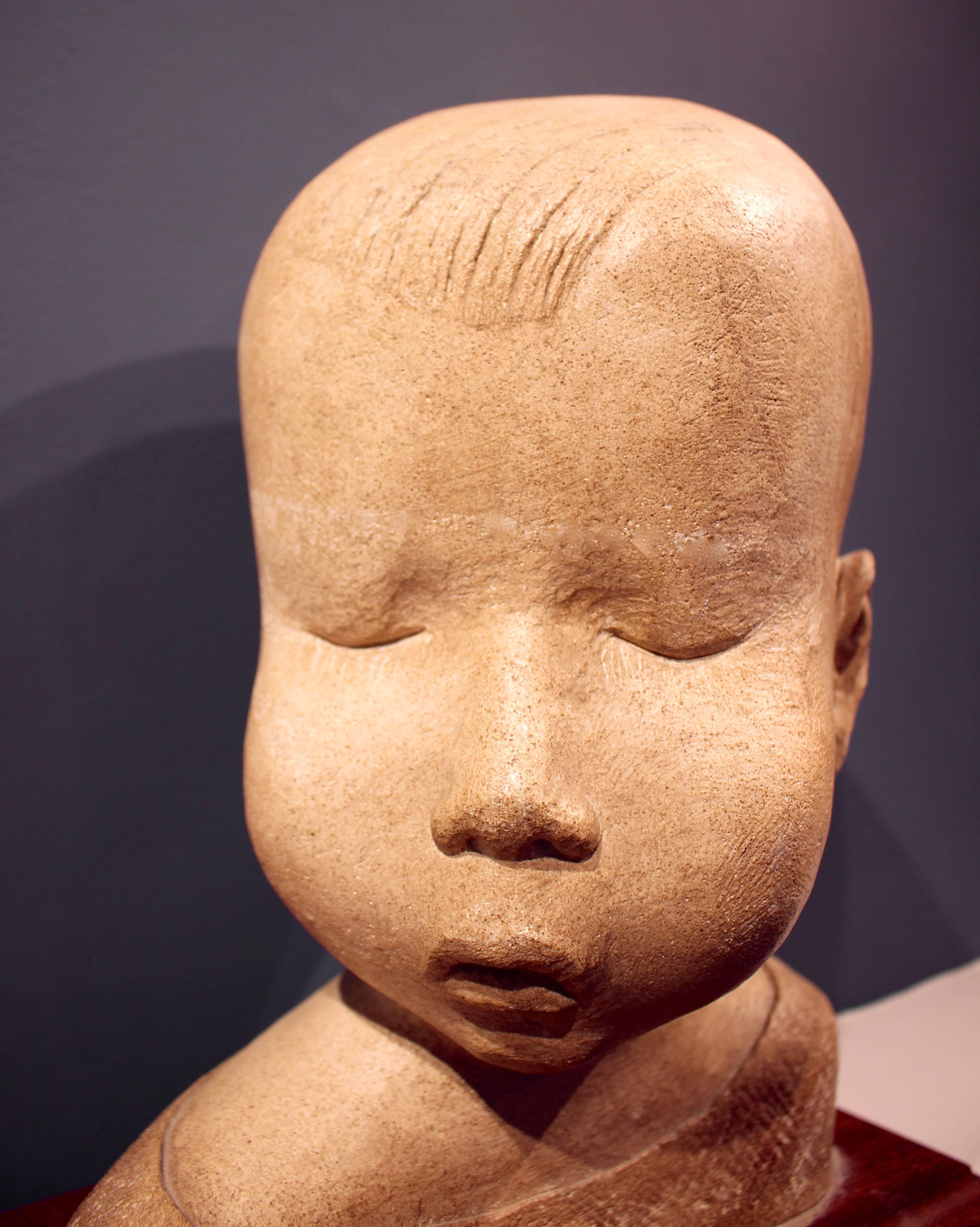 English Early 20th Century Carved Stone Bust of a Young Child