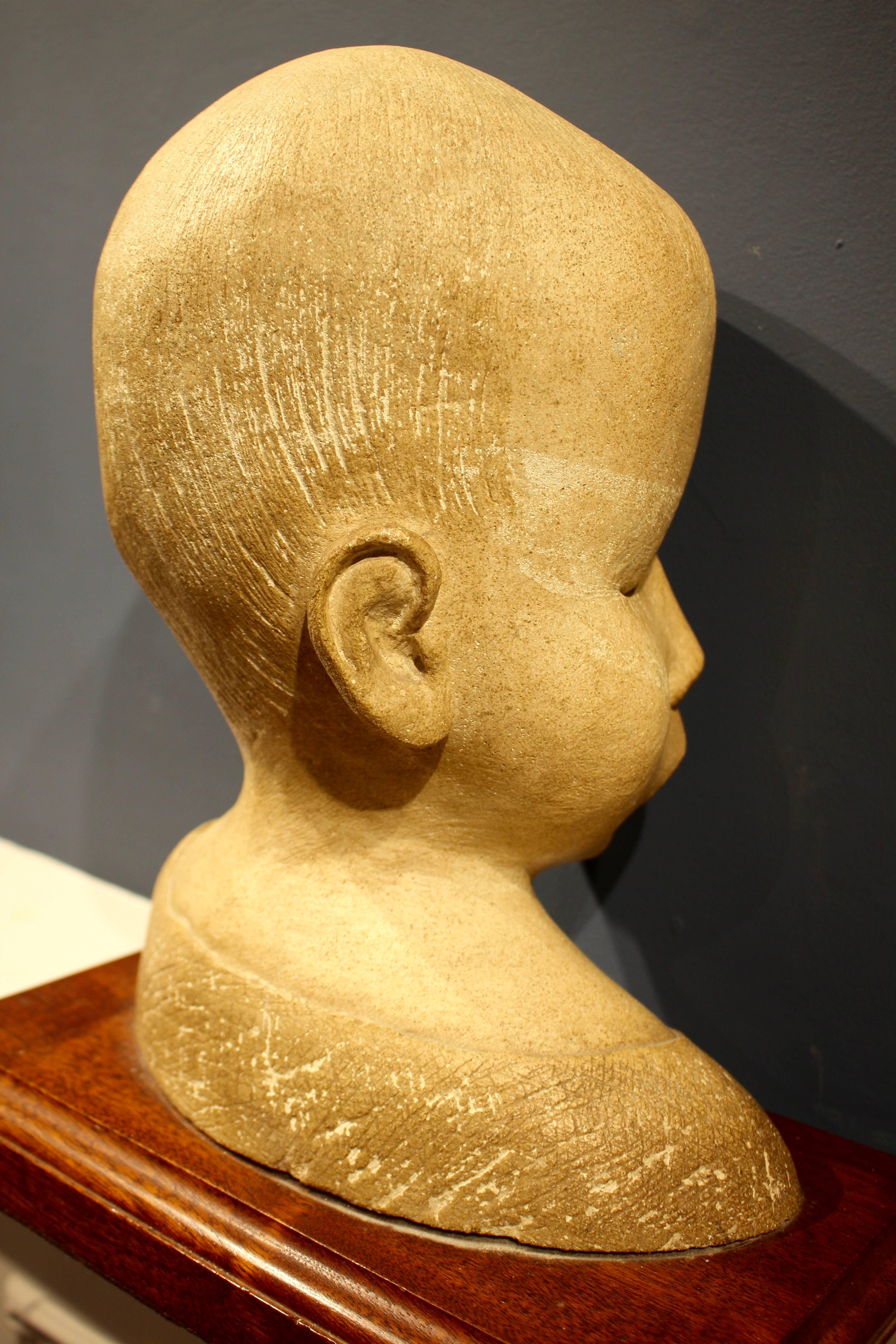 Early 20th Century Carved Stone Bust of a Young Child 1