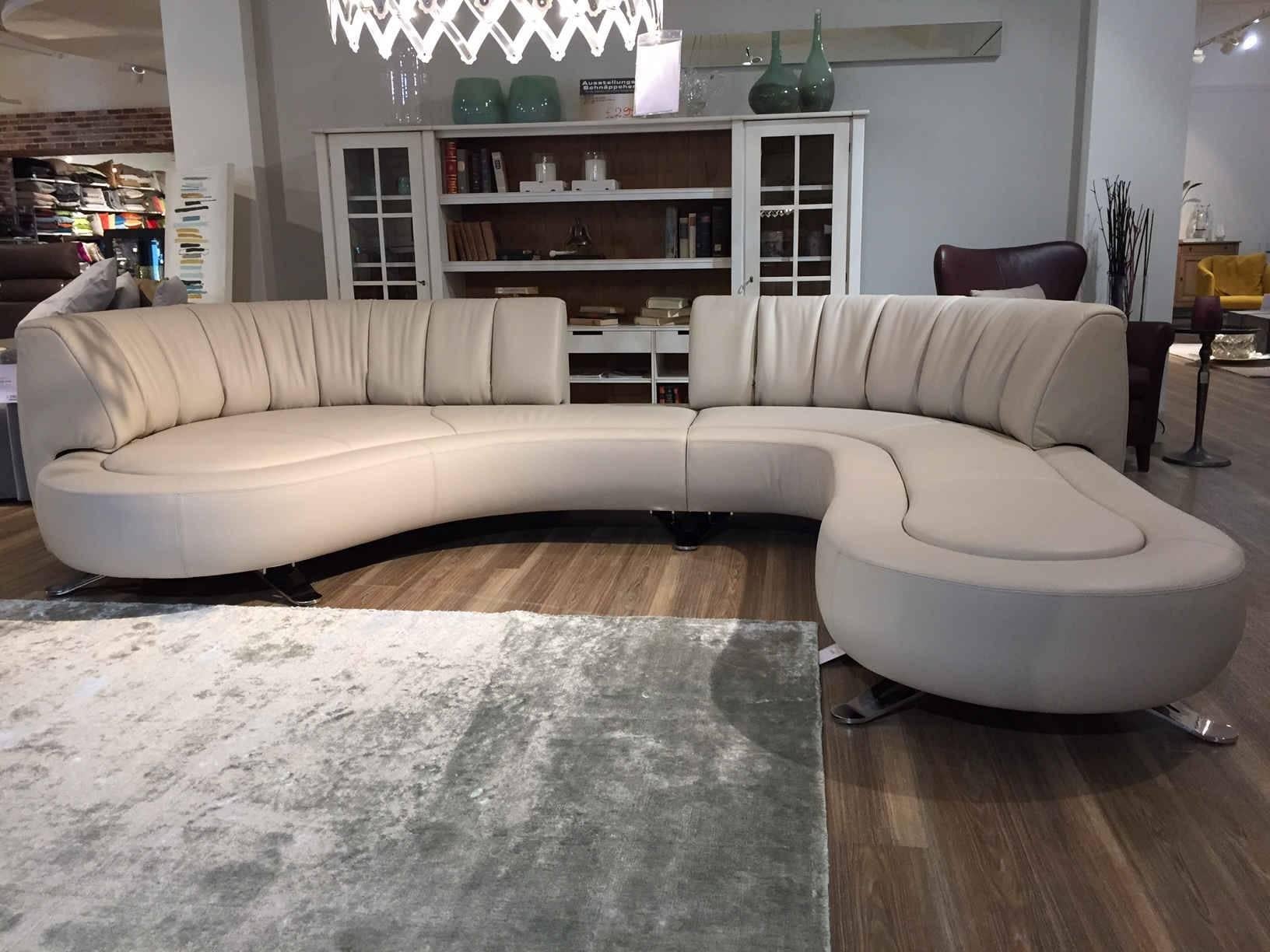 This landscaped interior is an absolute Classic. Seat accommodation for more than six persons this sofa appreciates every apartment with much space. Since it is a well-treated showroom sample this Fine design piece is in excellent condition.