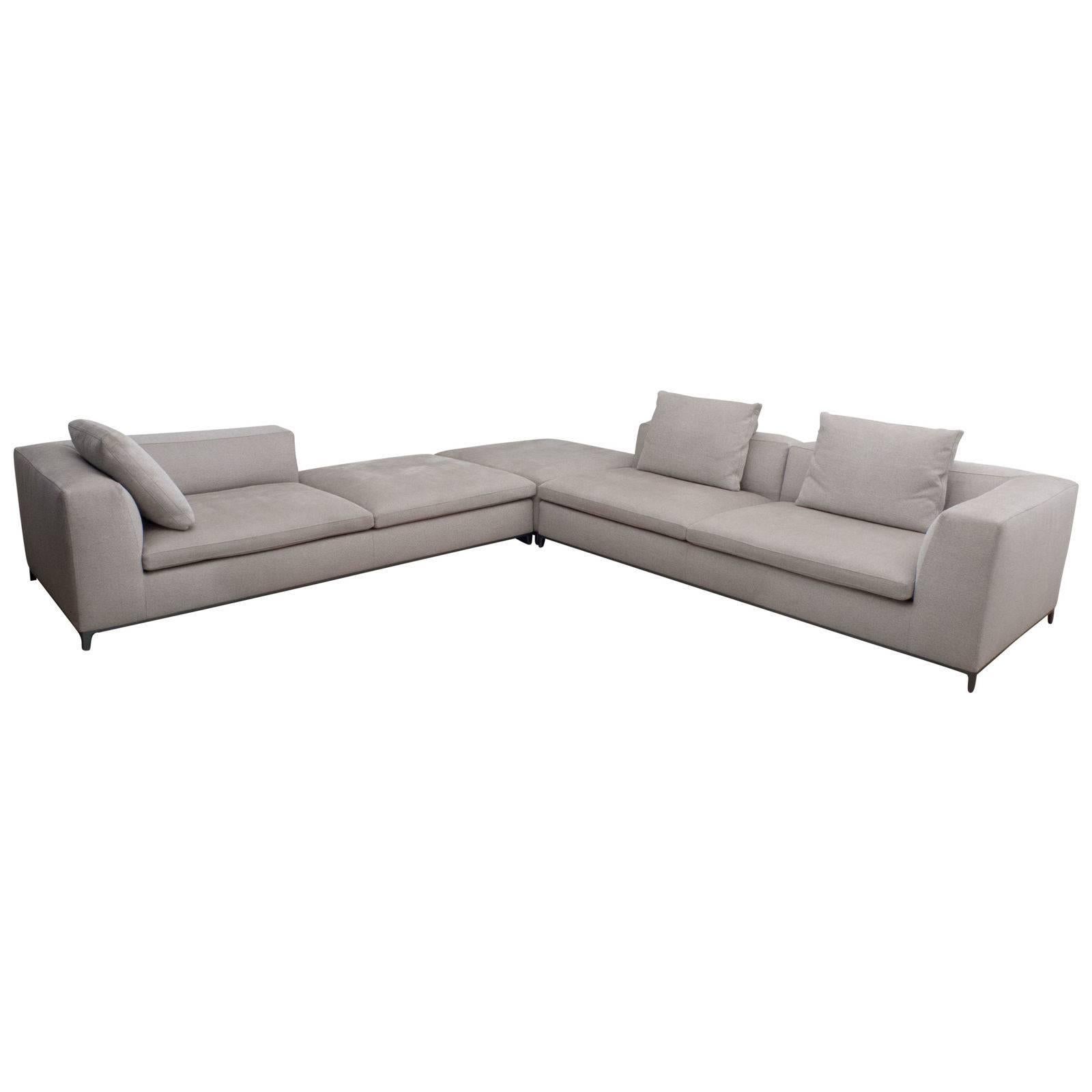 Corner sofa michel club comes with an ottoman and is made from polyurethan upholstery for cosy seating. Finished with finest fabrics this furniture item has proved for long lasting joy in every interior. Design by the famous Antonio Citterio.