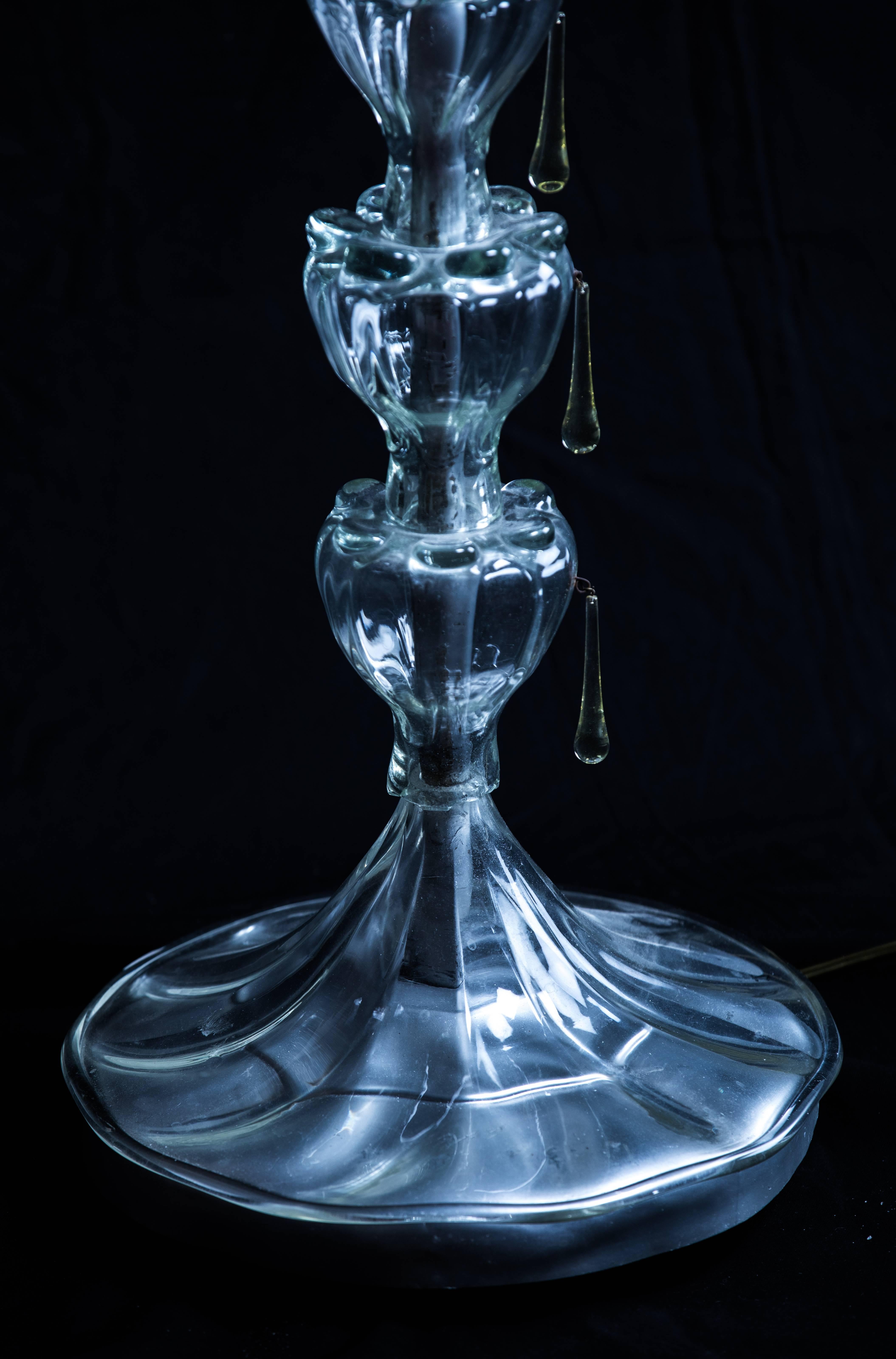 Italian vintage handblown Murano glass floor lamp with transparent details, glass drops next to each part of the lamp stem, on glass covered metal basement, late 20th century.