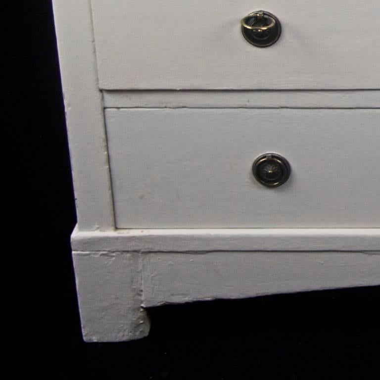 Lovely country Gustavian chest of drawers commode from North Sweden made from really dense pine. 

Classic design piece with huge storage in the three drawers and very heavy construction. 

It has been repainted in a white chalky paint and has a