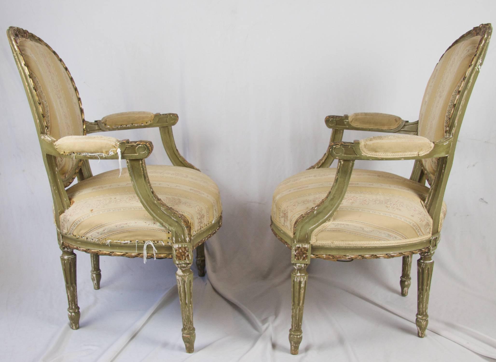 Very beautiful unusual Swedish antique Gustavian carver chairs intricately decorated with carved canework, acanthus leaf motifs and bow carvings.

Super comfy fully sprung seats and webbed back. Original gilt finish has developed a lovely patina