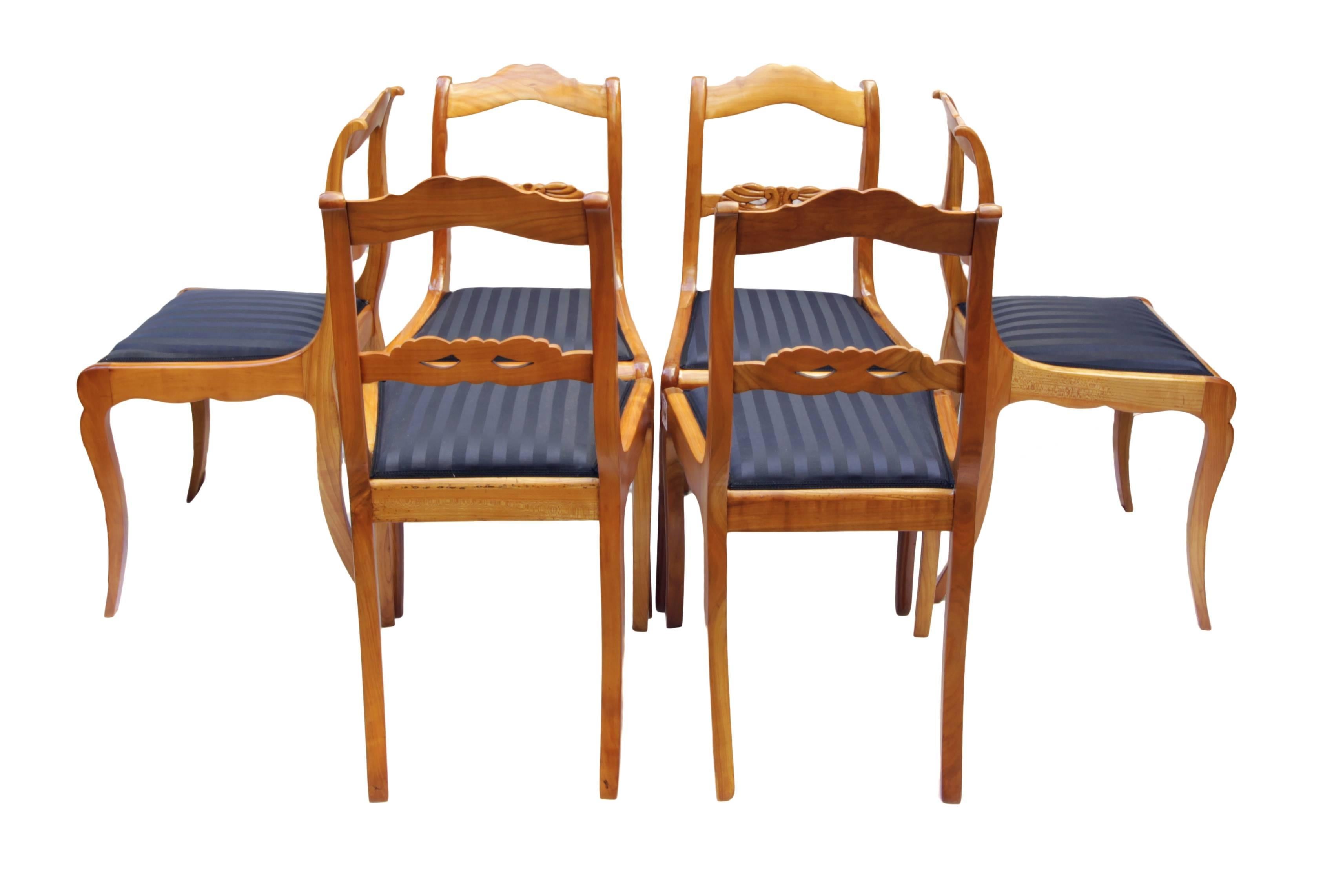 Set of six chairs, Biedermeier around 1825, solid cherrywood. The chairs were new re-upholstered. Measure: Seat height 46 cm. In very good restored condition. 