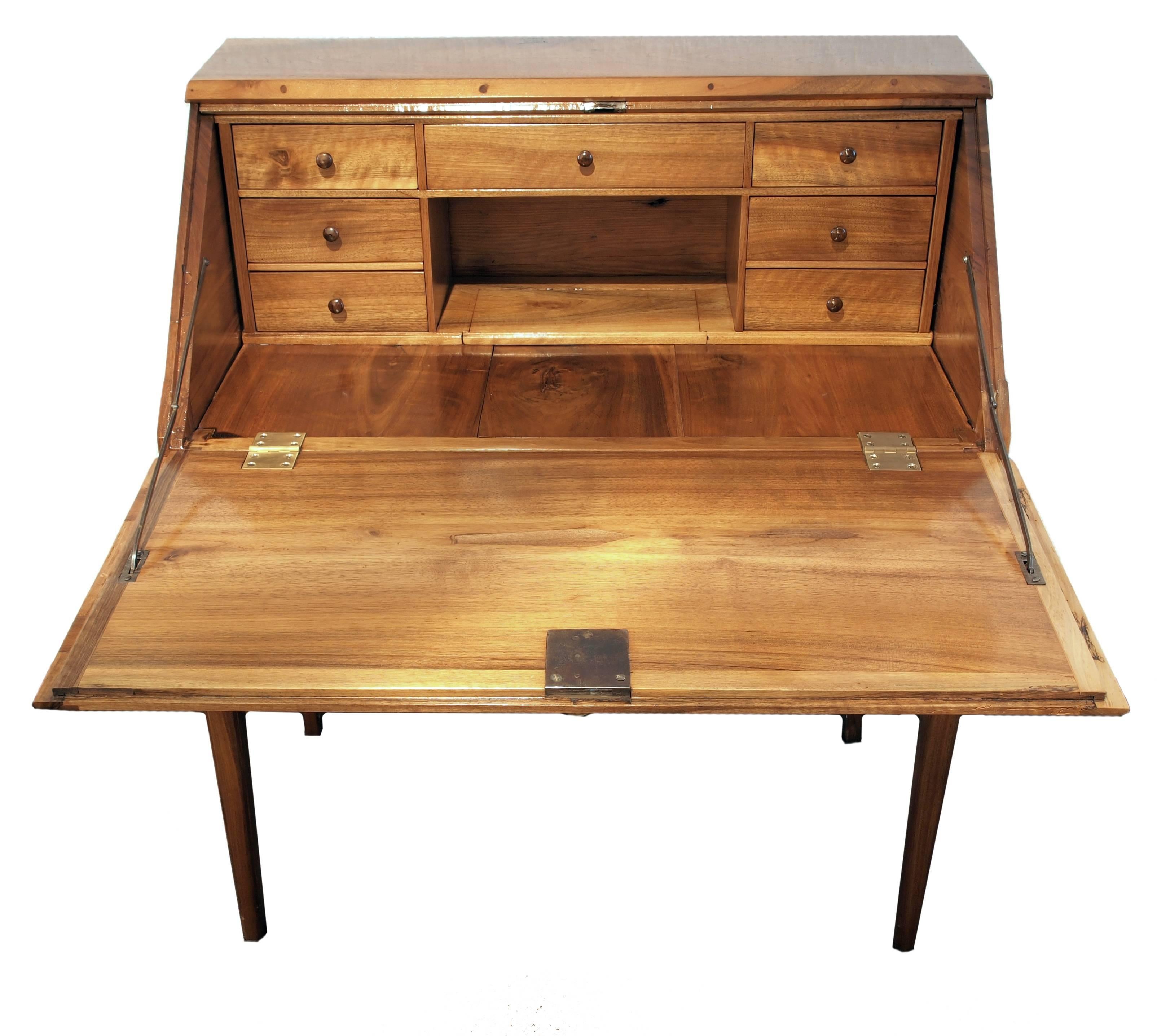 Very rare small oblique flap secretary made of solid walnut from the time of the Empire. Two drawers in closed condition. Inside there are 7 drawers and an open compartment as well as a secret compartment in the floor. The back wall and the inner of