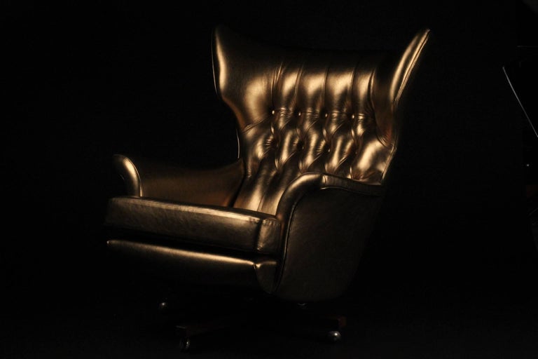 Once described as 'the worlds most comfortable chair' this one off reupholstered piece in Italian vintage gold leather will surely bring out your inner Bond Villain. Appearing in original black the model 62 was used in The Bond movie You only live