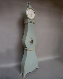 Early Mora Clock with Carved Urn Finial