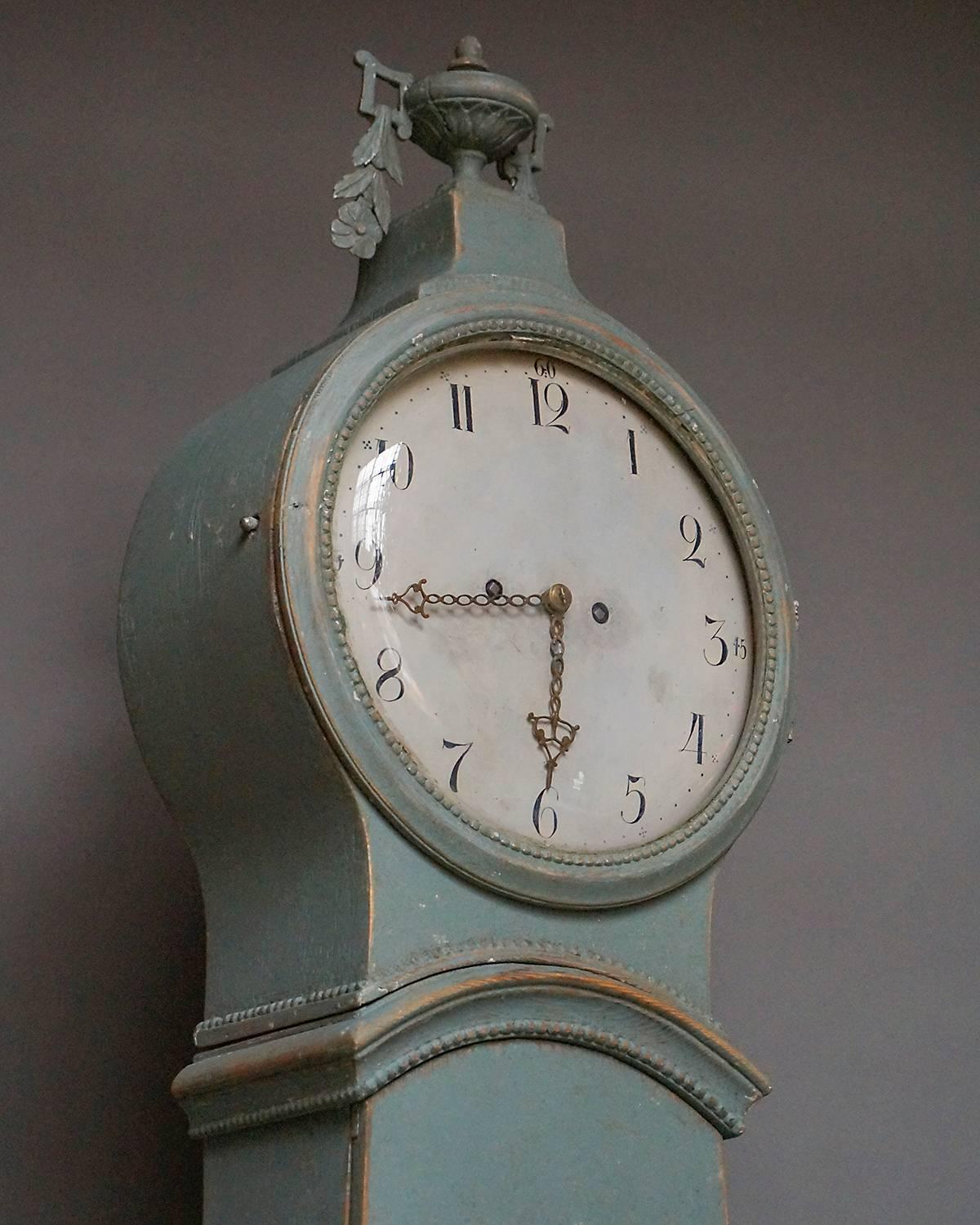 Rococo Early Mora Clock with Carved Urn Finial