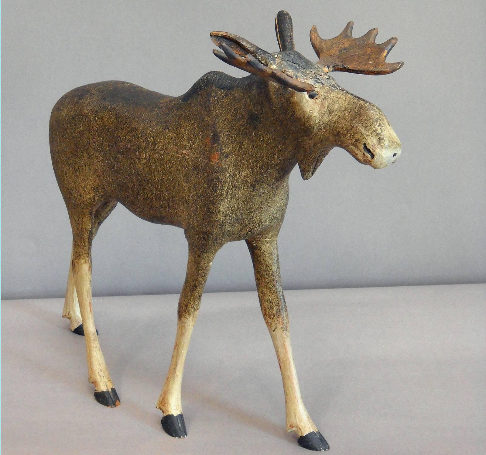 Beautiful carving of a bull moose, Denmark, circa 1900. One ear has been reglued, but no other repairs.