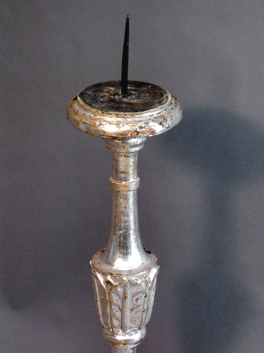 Pair of altar candlesticks, Italy, circa 1780, with silver leaf on the front sides, an interesting technique which provides the greatest effect for the least cost.
