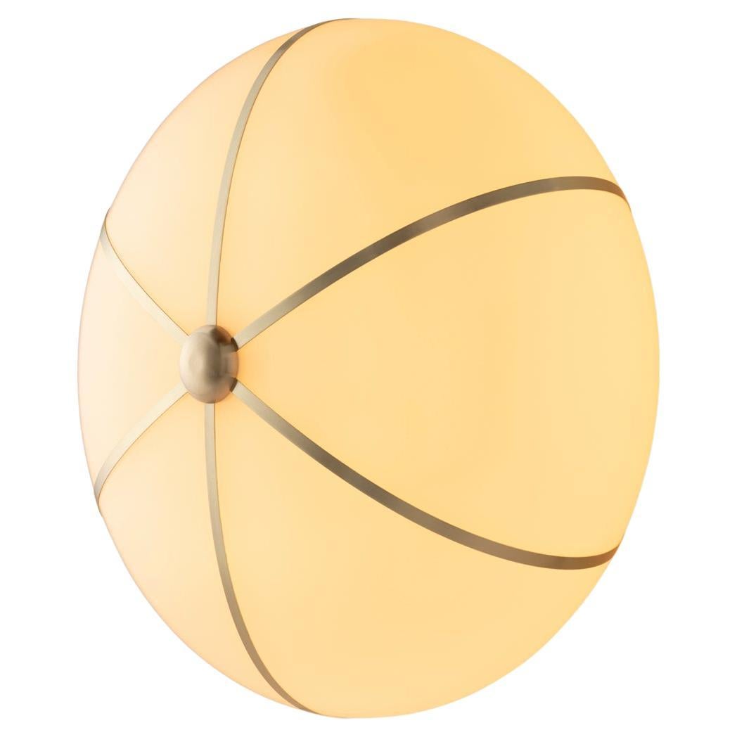 The Rib Sconce - Large Ellipse is blown in Italy and delicately framed by thin brass ribs. Can also be used as a ceiling flush mount.

This listing is priced in the satin brass finish. Please inquire for pricing of other finish options.
