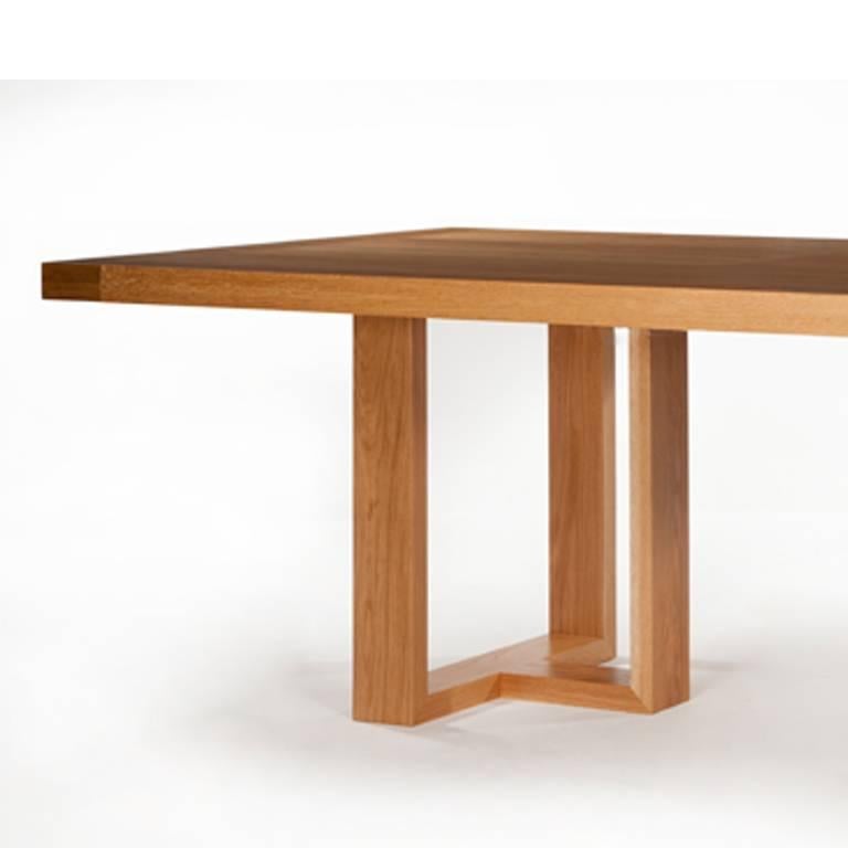 Dining table in solid oak to seat eight-ten with geometric form base.
Hard wearing, hand-burnished lacquer finish.