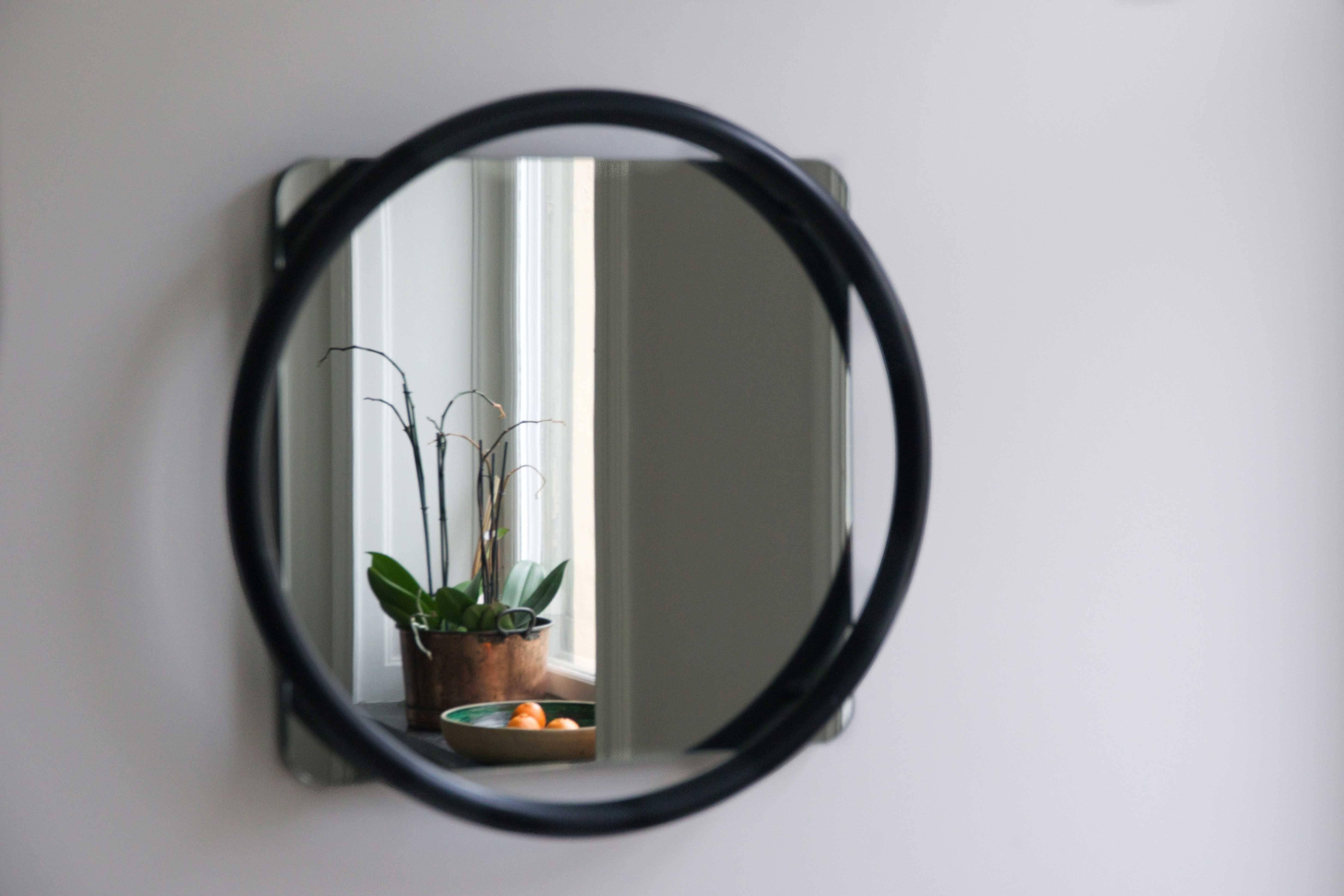 As part of the Vima collection, the Vima Mirror stays true to the collection's form and language by keeping the thick and bold circular structure. The circular tube is attached onto the mirror with a 2 centimetre distance and acts as a floating