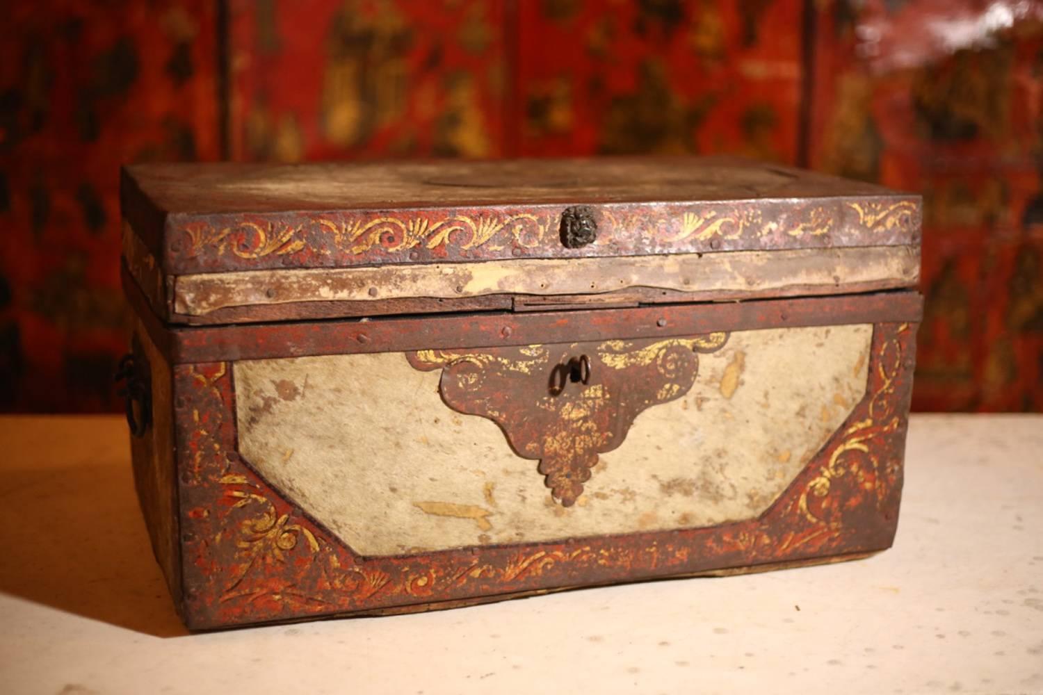 This is the most impressive pony hide covered trunk I have ever seen. It eats to the late 18th century to the early 19th century. Not only does it come with remains of original paint but it also has a fully working lock with original key. The pony