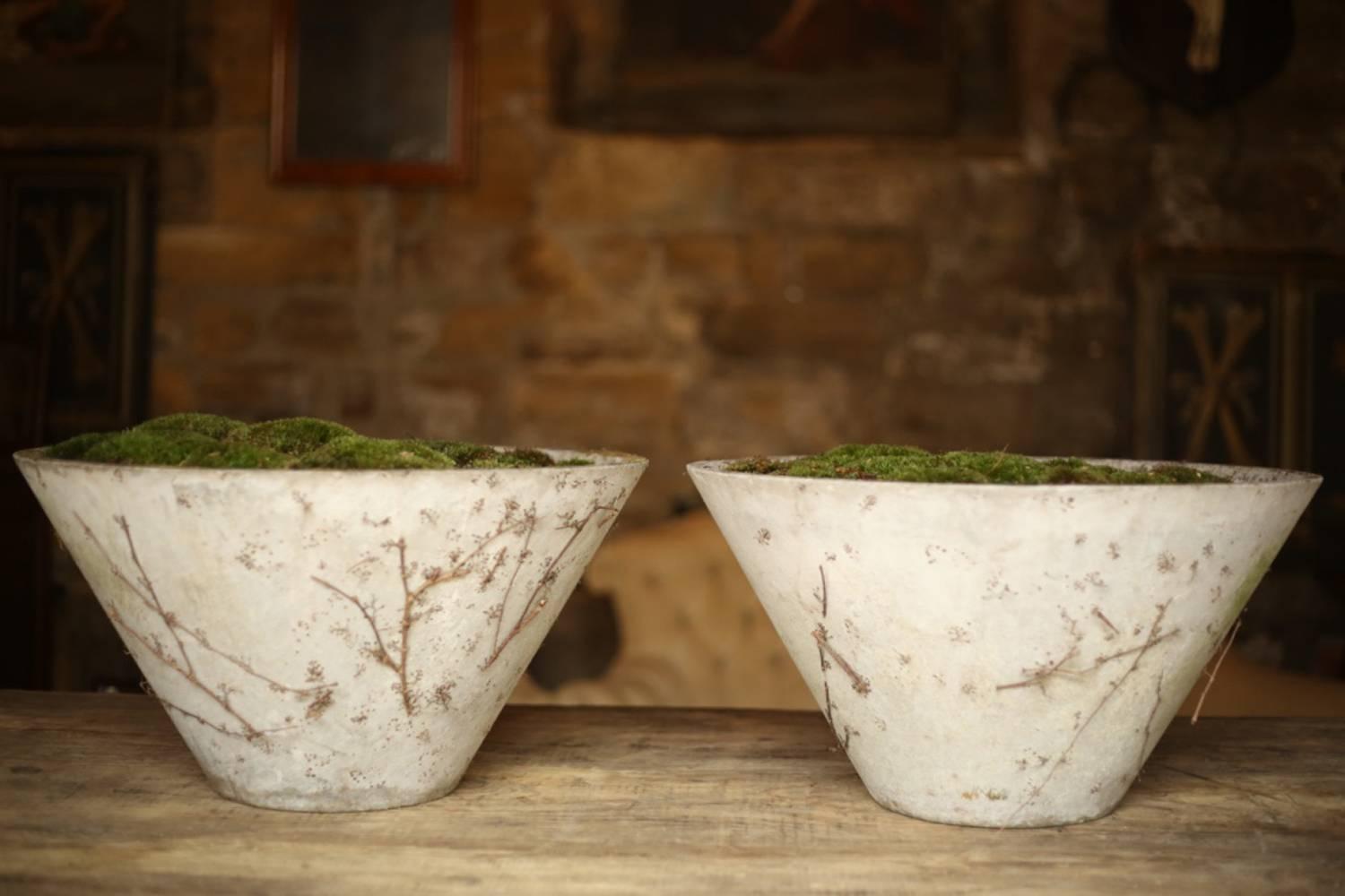 These are a very stylish pair of mid-20th century fibre concrete planters by the renowned designer Willy Guhl (1915-2004). The simplicity of the design is what makes these so attractive for both interior and exterior use. I have planted these out