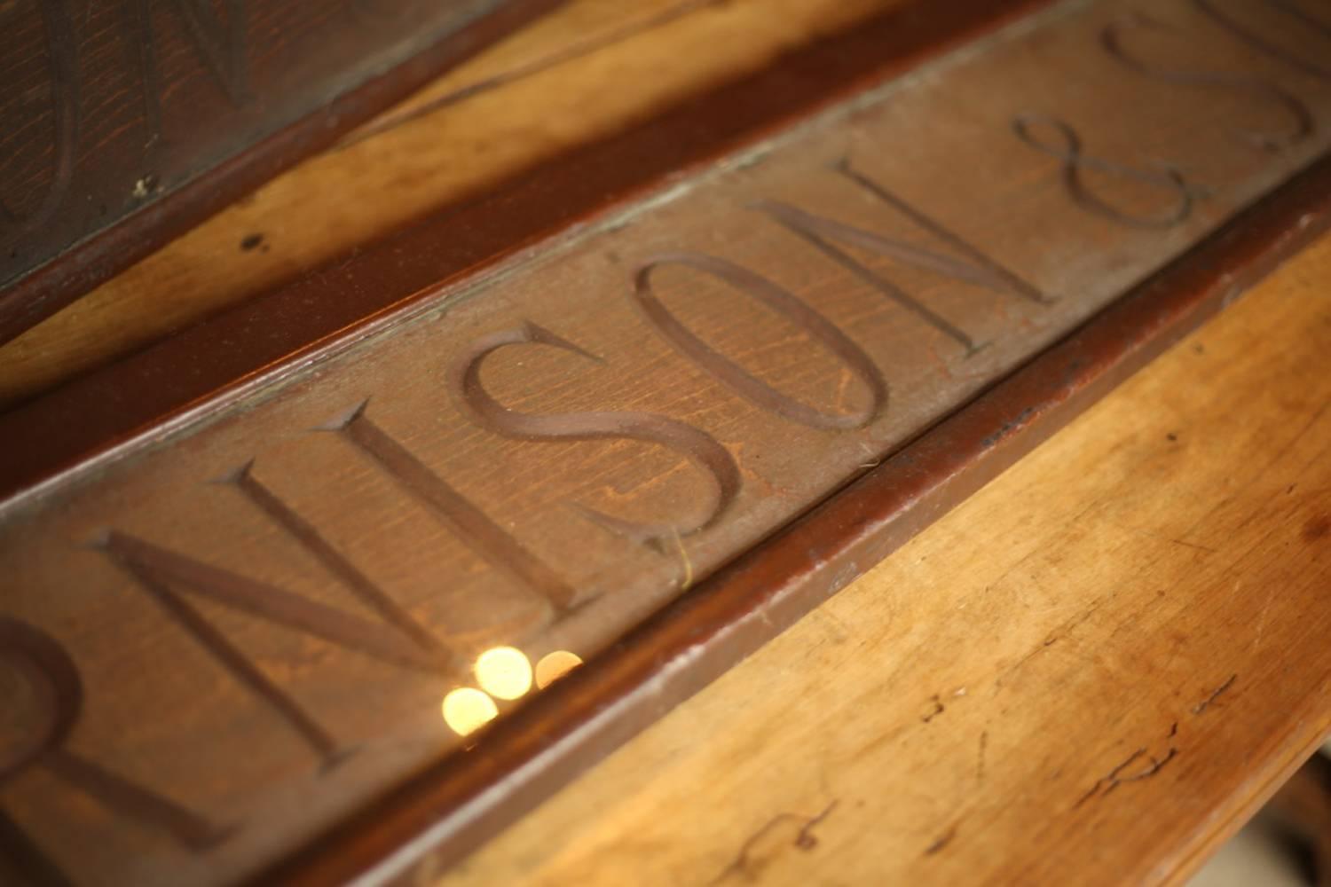 Early 20th Century Pair of 19th Century Carved Wooden Shop Signs- 'J Arnison & Sons' For Sale