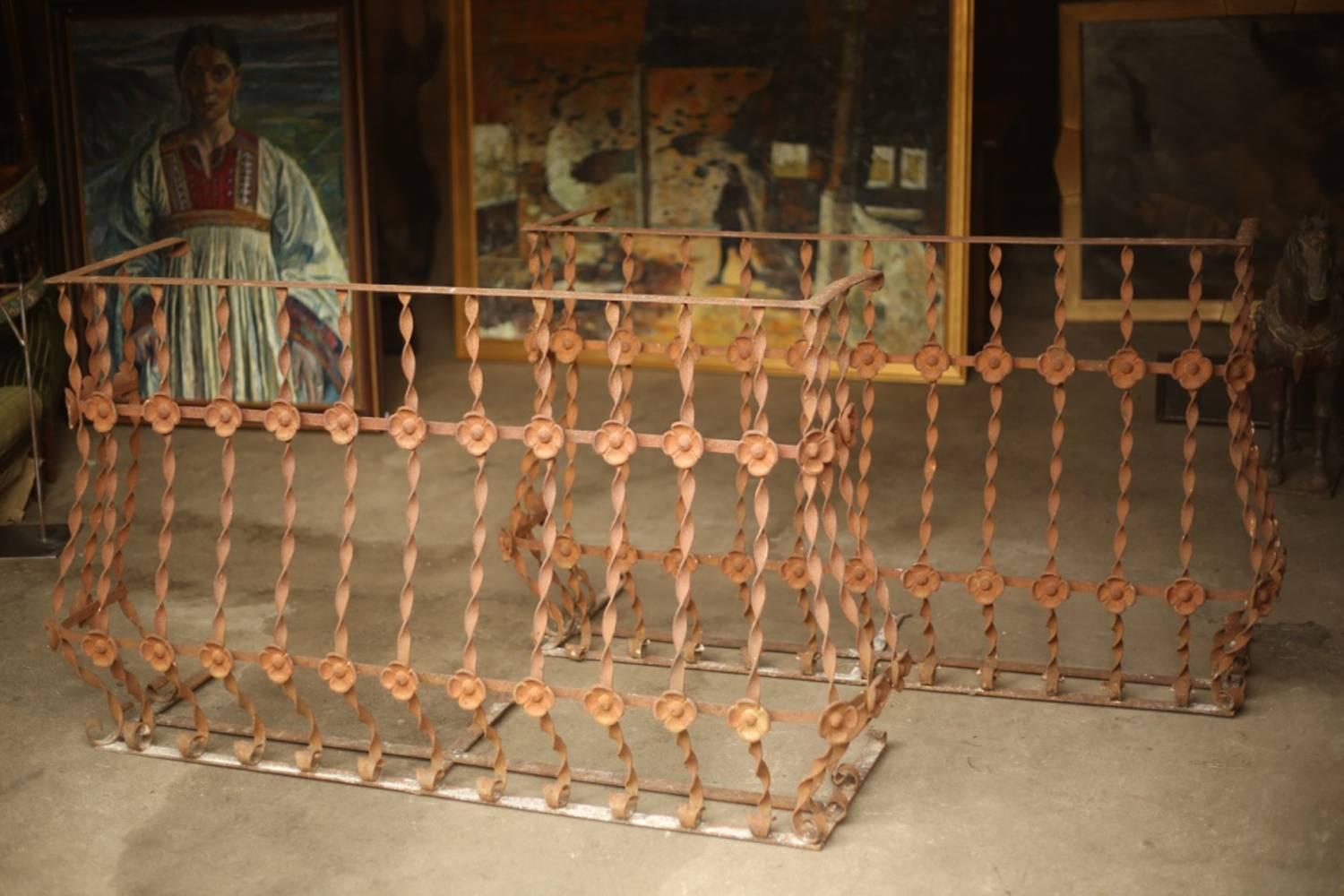 These are a beautiful pair of 19th century iron balcony railings from Spain. They have a superb amount of detail on them and are amazing quality. I am trying to source marble for the top to make them into console tables but are currently available