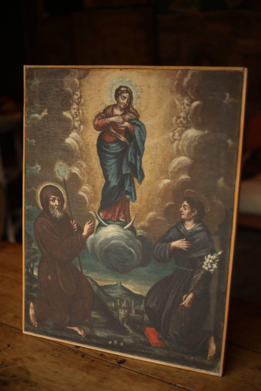 This is an exceptional piece of Religious art work. It dates to the 18th century and is Italian in origin. The painting depicts the ascension of Mary. It is in a similar manner of the ascension of Christ painting. It shows the Virgin Mary raising up