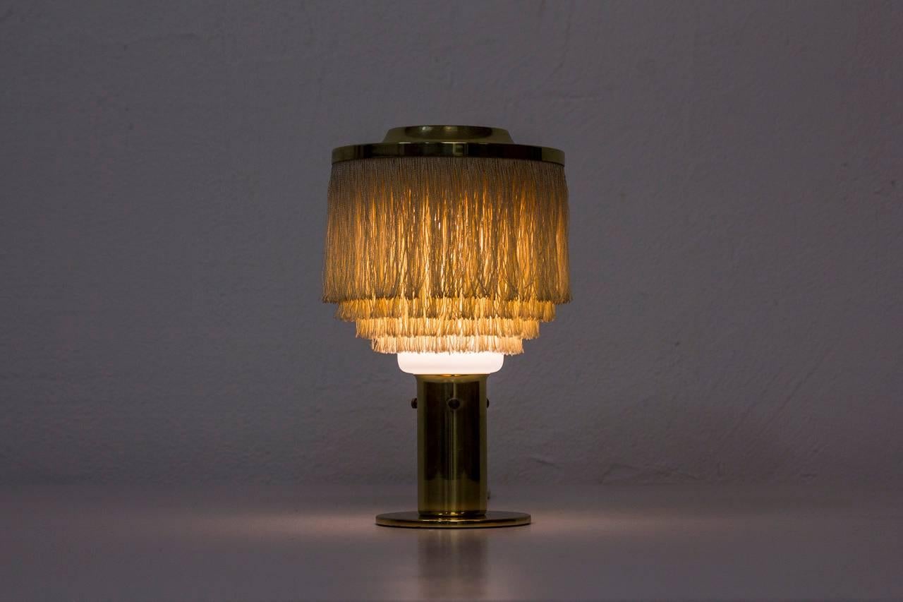 Mid-20th Century Hans-Agne Jakobsson Model B 145 Silk Fringes Brass and Opaline Glass Table Lamp