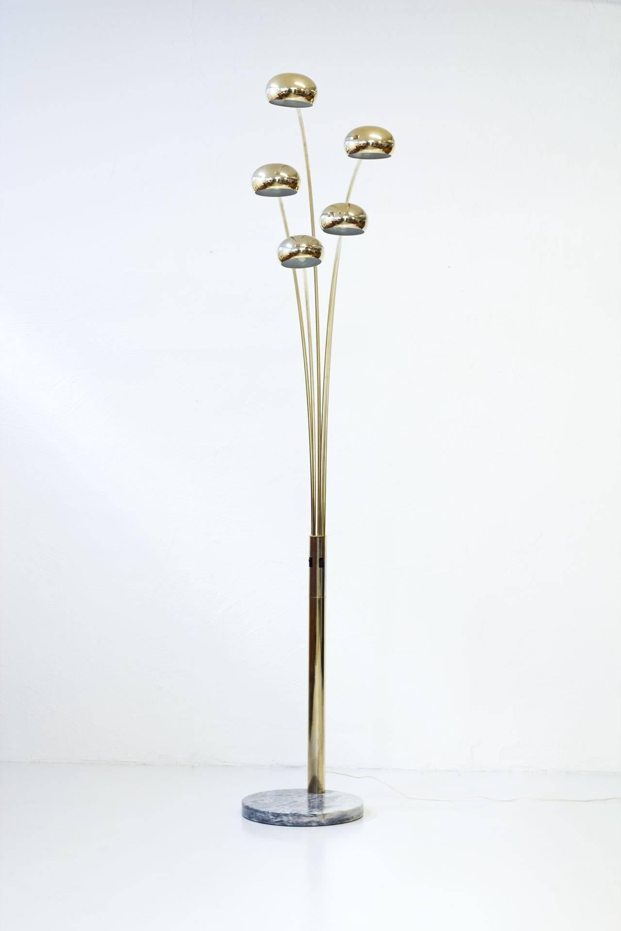 Five-armed floor lamp produced by Lamp Gustav in Sweden during the 1970s.
Stainless steel lacquered gold. Adjustable arms and reflectors. Marble base.
Two switches on stem. Lighting option two, three or five.
 