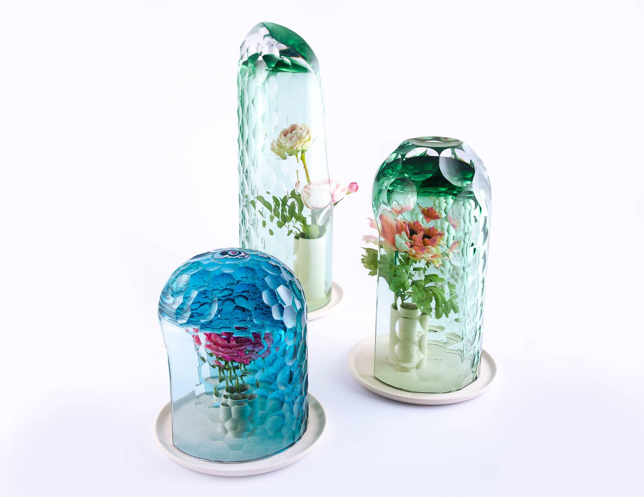 A signature quality of each handcrafted glass vase is the illusion created by its complex pattern of cuts. A kaleidoscopic effect is created within each glass form, so that when viewed from different angles, a single owner placed within it, OP-vase