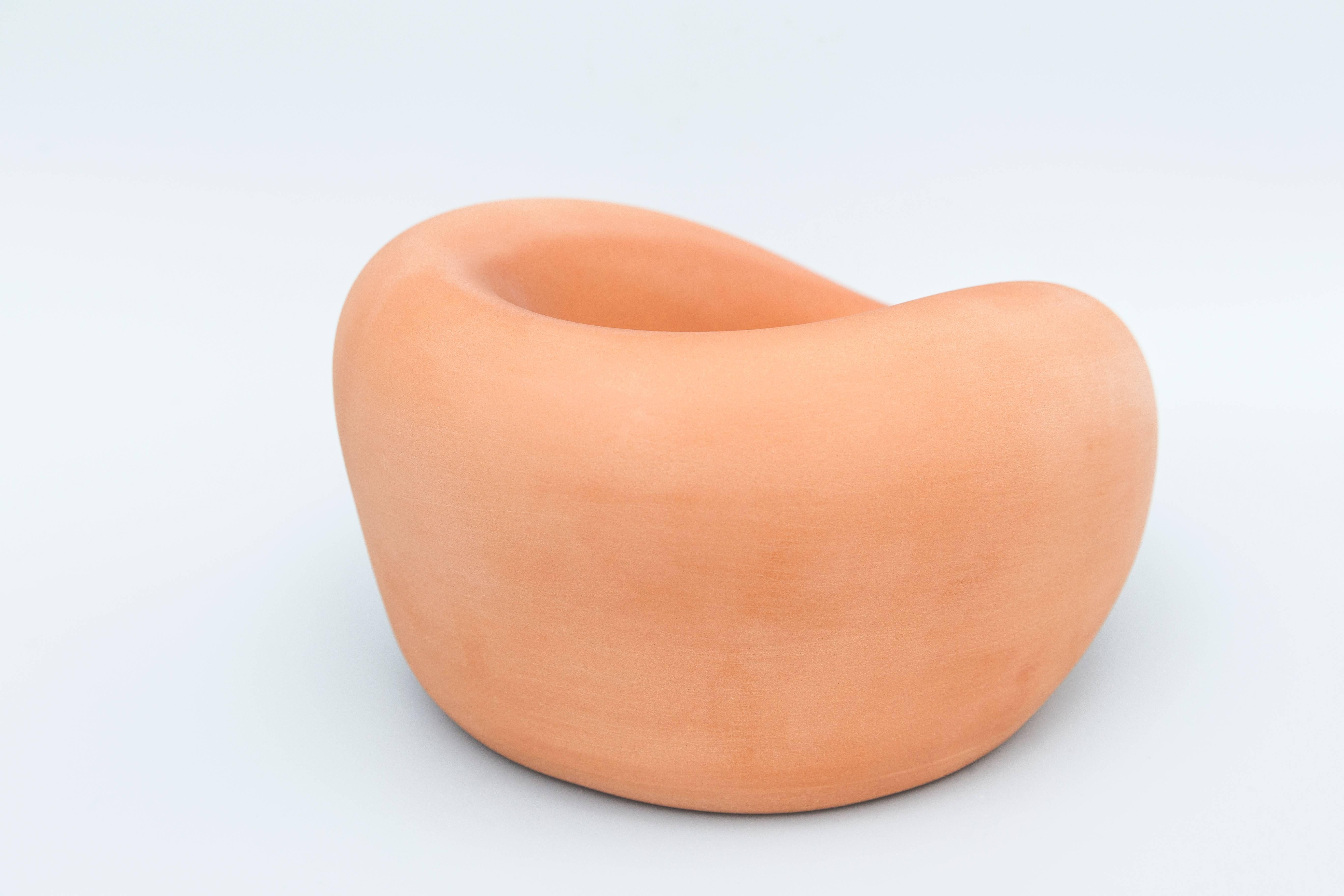 Touch bowls are ceramic bowls in various sizes made with imprints of the human body. Touch bowls is a continuous research through sculptural objects investigating what kind of shapes and suggestive functions human body can provide. It's about forms