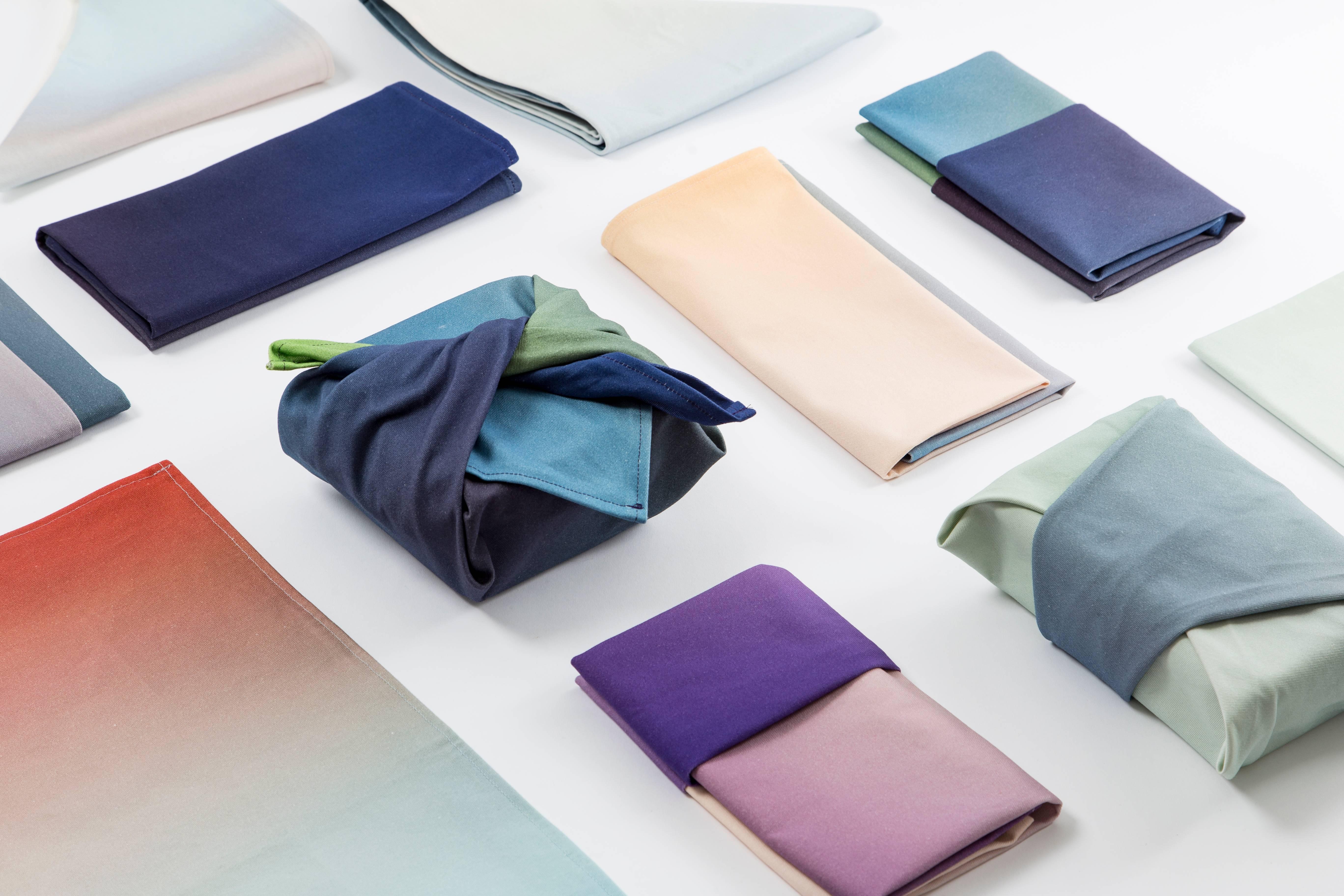 Hues Tea Towels is a collection of color experiments turned into usable cotton tea towels and napkins. Each fold revelas a new color and composition. 
These kitchen cloths can be used as tea towels, place mats, wrapping cloths or table runners. The