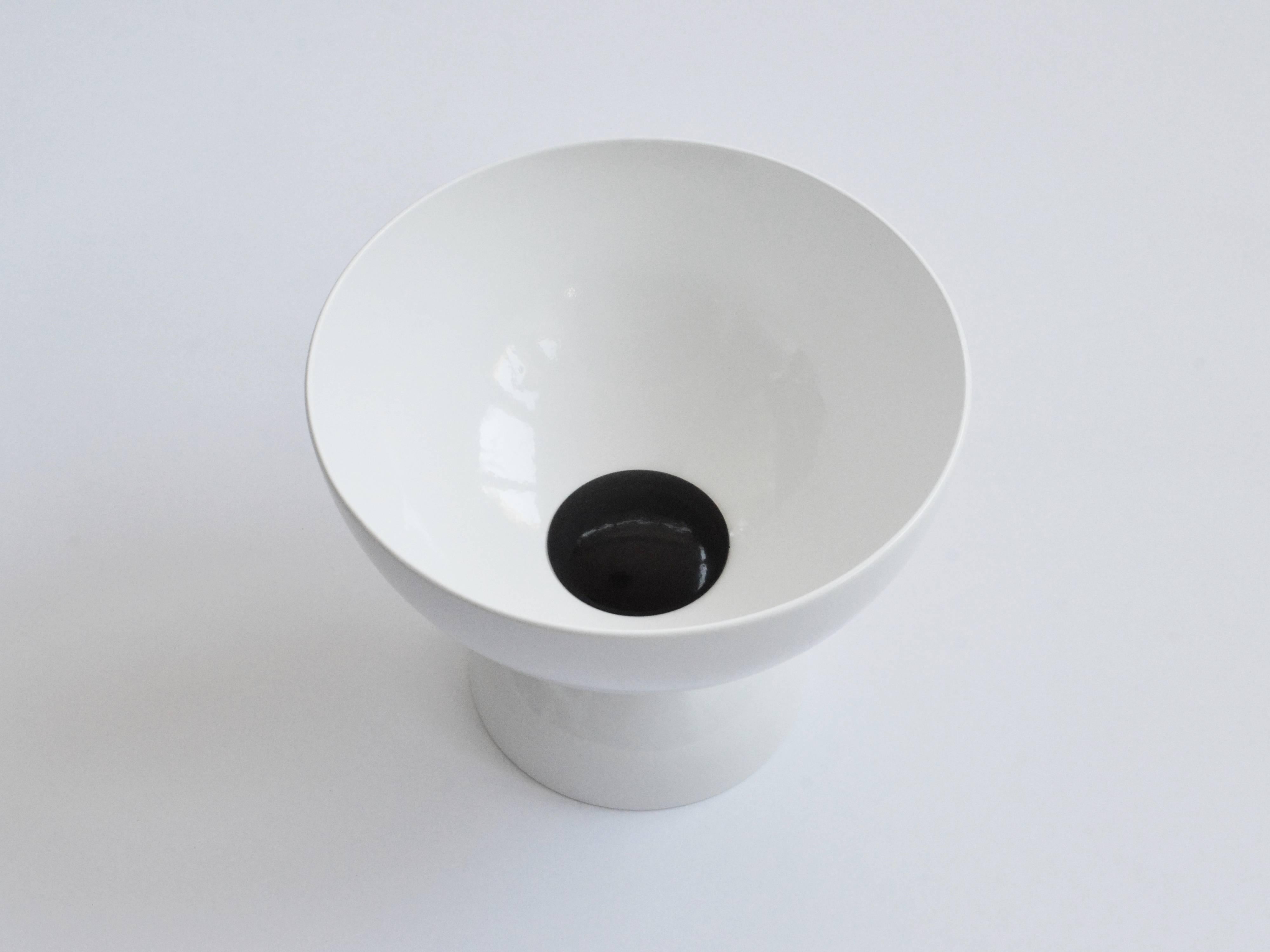 Contemporary bowl designed and made by independent product and furniture designer Connor Holland.

The Cassini Bowl is part of the Saturn Six range, a series of designs inspired by space exploration and the Saturn V rocket. The median of the three