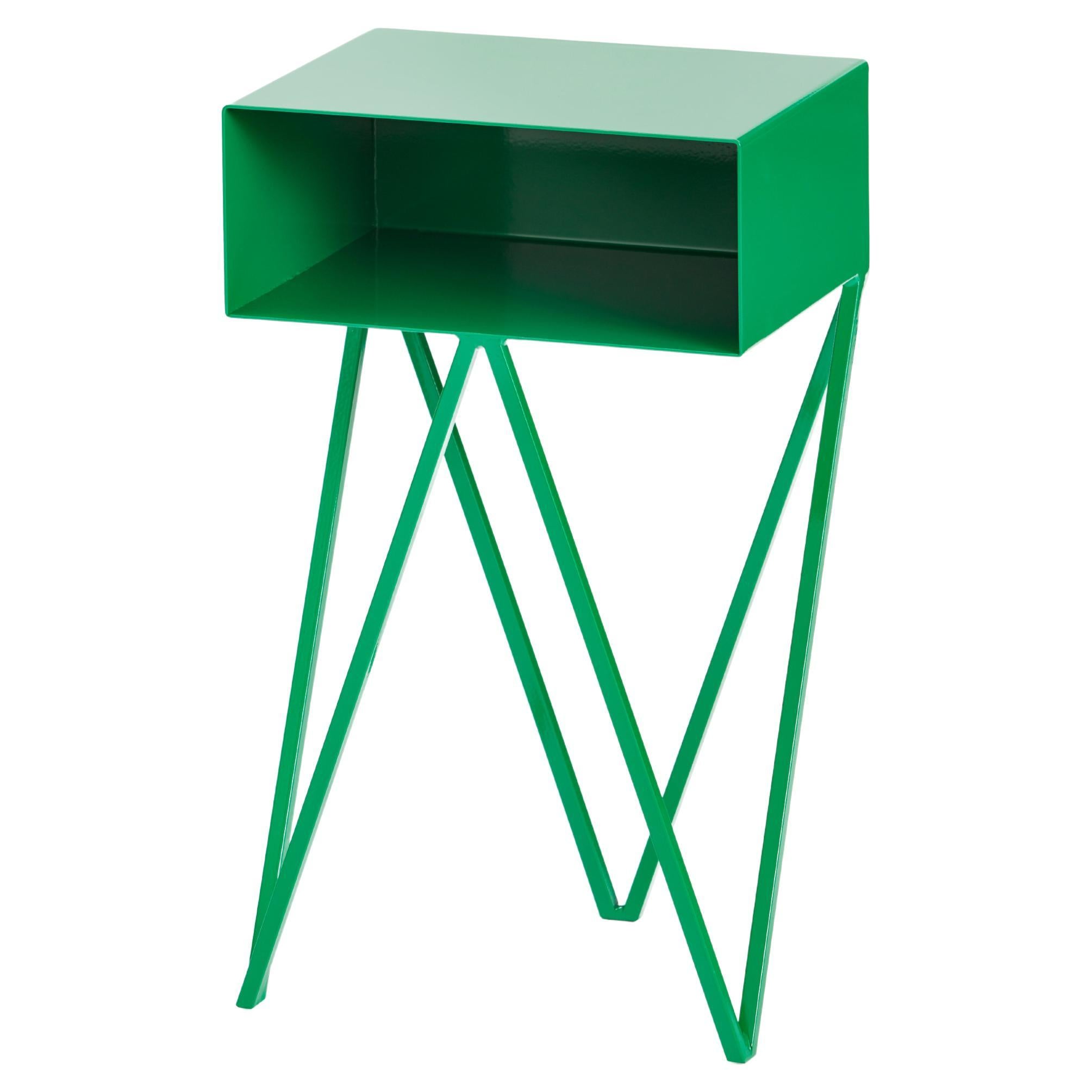 The Mini Robot side table is a perfect next to a sofa or chair, just large enough to hold magazines. Made with solid steel legs, the table is made to last. The Mini Robot bedside table has &New's signature Zig Zag legs and is available in fifteen