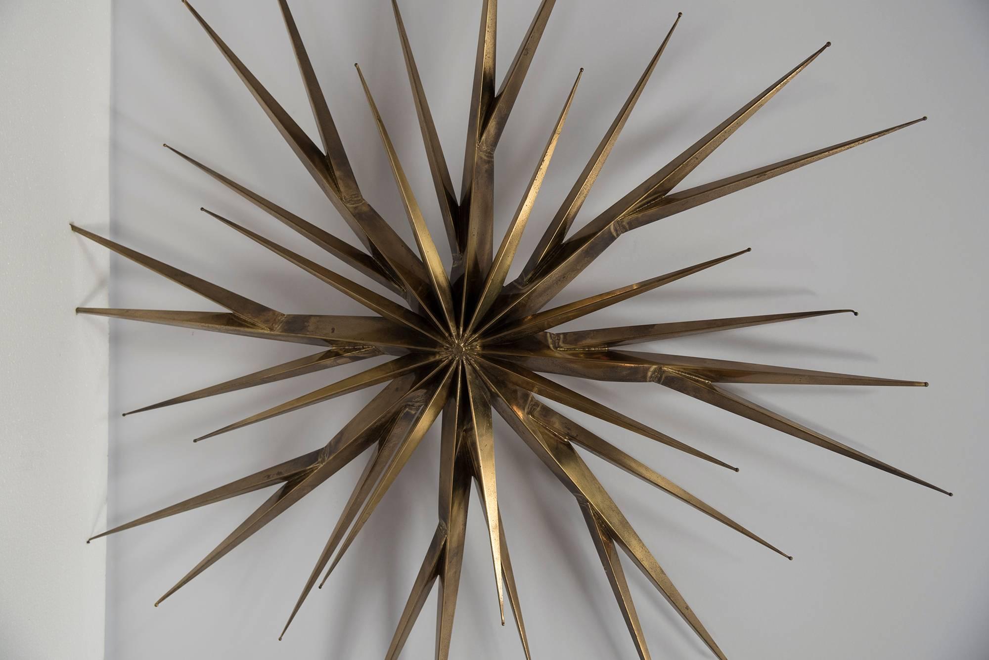 A unique starburst sculpture by Curtis Jere. Though the name Curtis Jeré is familiar to many as the maker of ebullient and eccentric modern design from the 1960s and 1970s, relatively few are aware that it is a pseudonym for the design team of