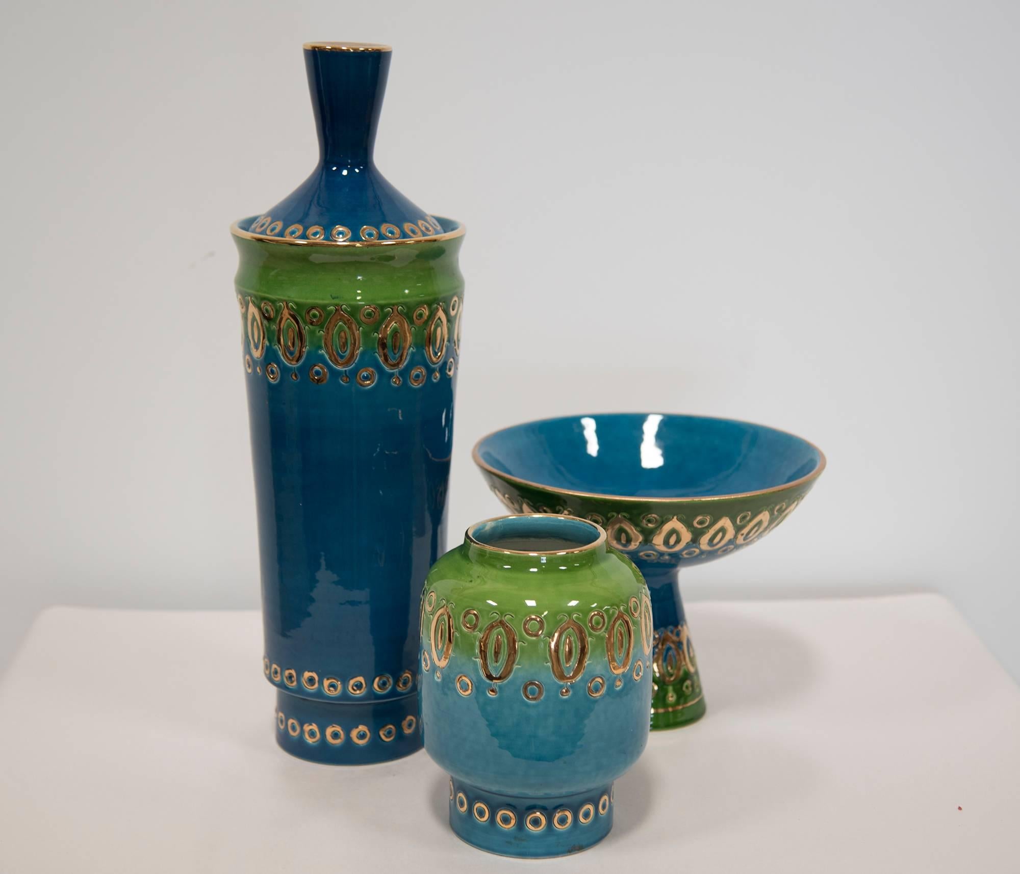 A three-piece colorful ceramic set designed by Bitossi for Rosenthal. Brilliant blue and green colors with gilt adornment, Italian, 1960.