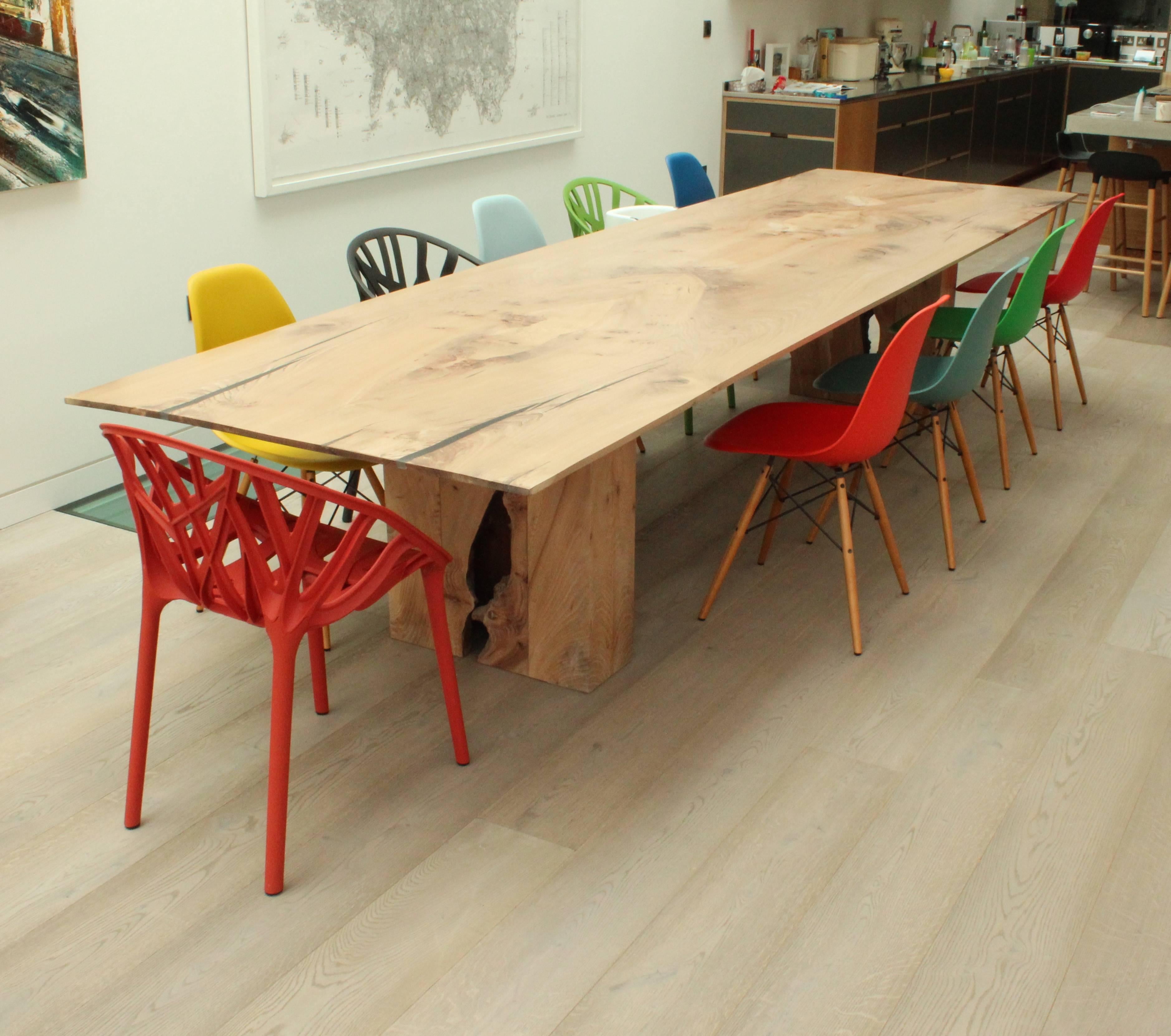 Modern Contemporary solid English elm dining table, book matched with a taper edge, 