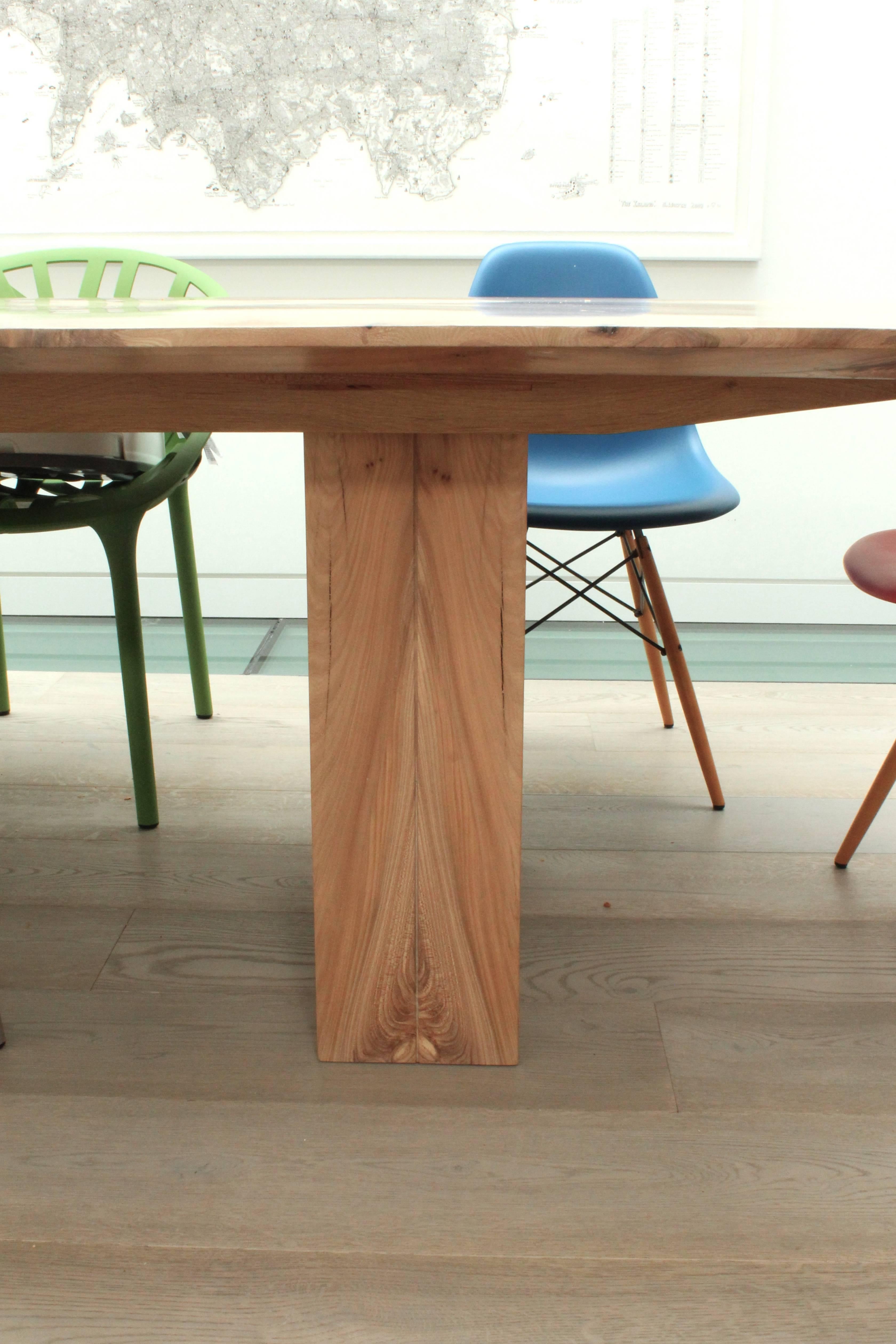 Resin Contemporary solid English elm dining table, book matched with a taper edge, 