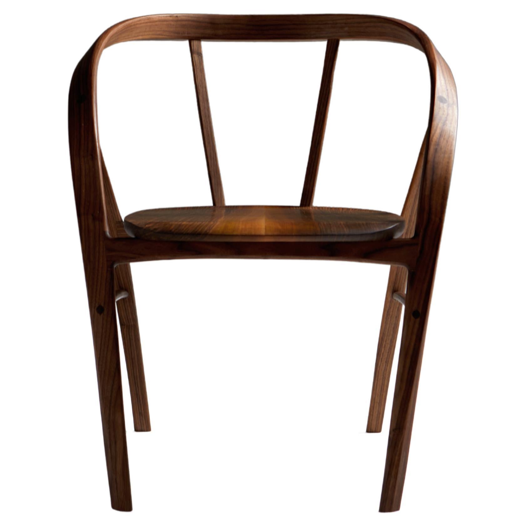 Six Carol Chairs in Bent Wood Walnut by Jonathan Field. 