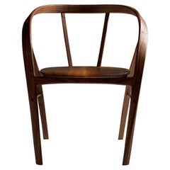 Six Carol Chairs in Bent Wood Walnut by Jonathan Field. 