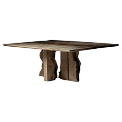 Dining Table in English Oak with inverted live edge centre legs 
