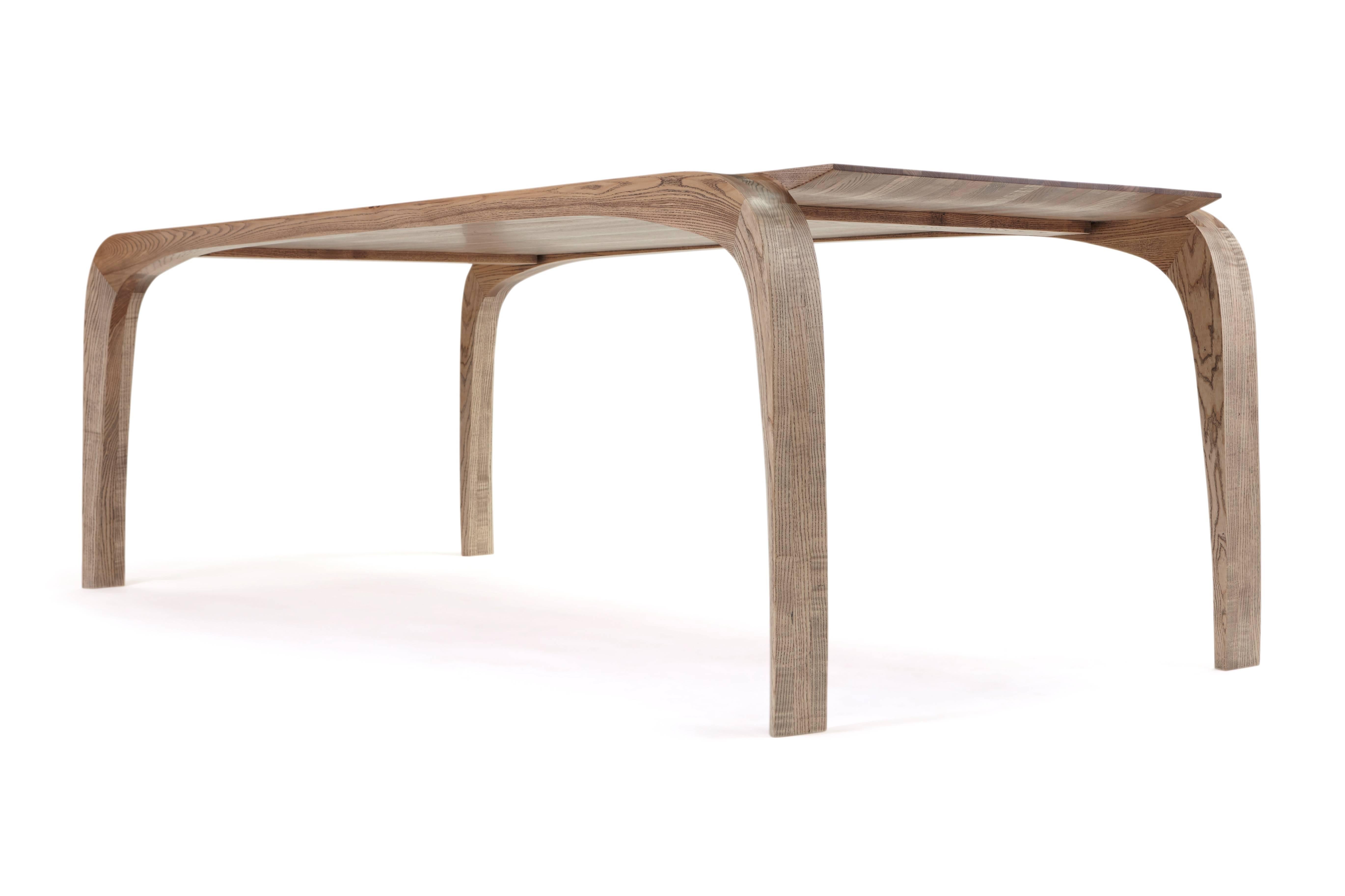 English Contemporary bespoke ash dining table. hand shaped legs by Jonathan Field.