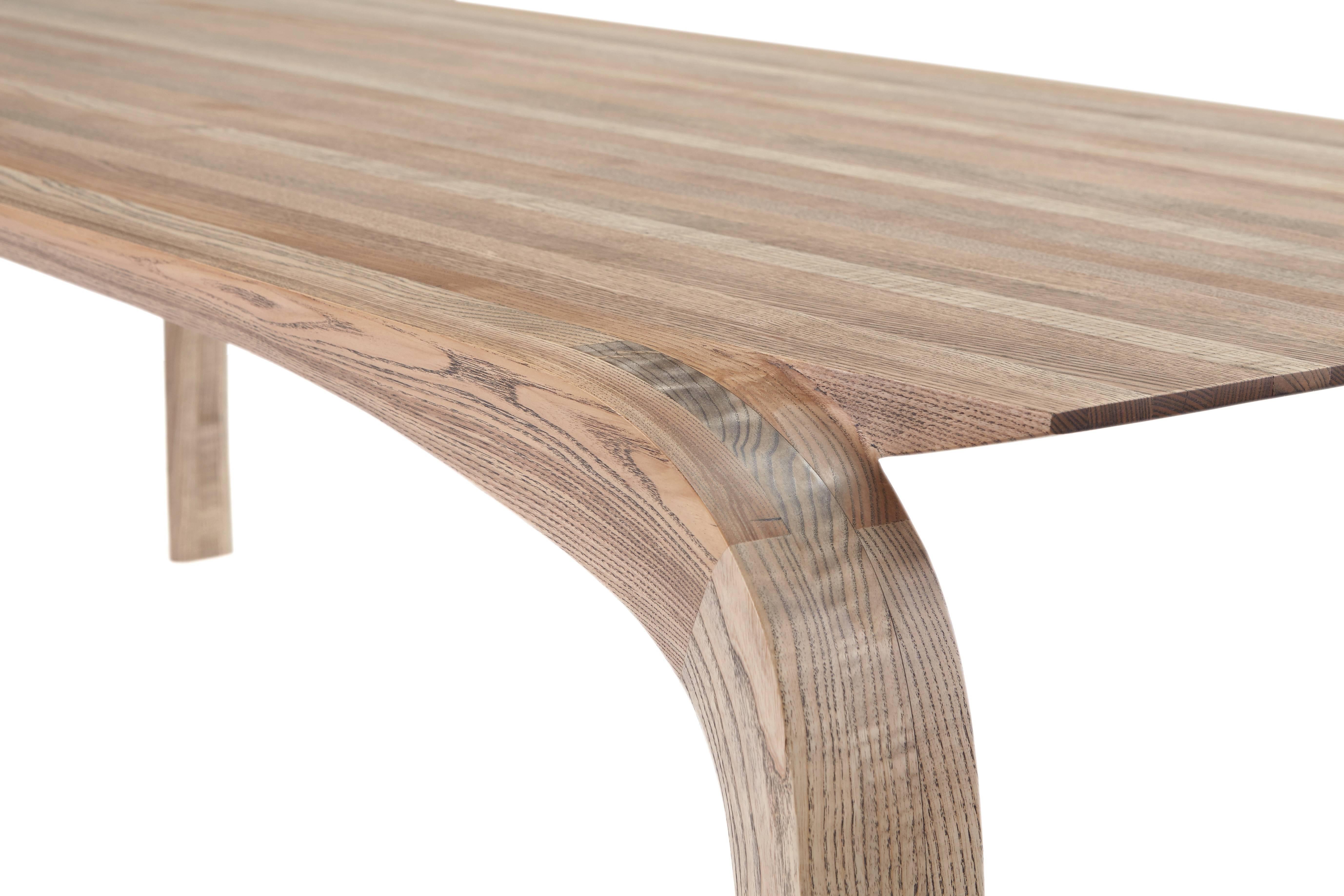 Contemporary bespoke ash dining table. hand shaped legs by Jonathan Field. 2