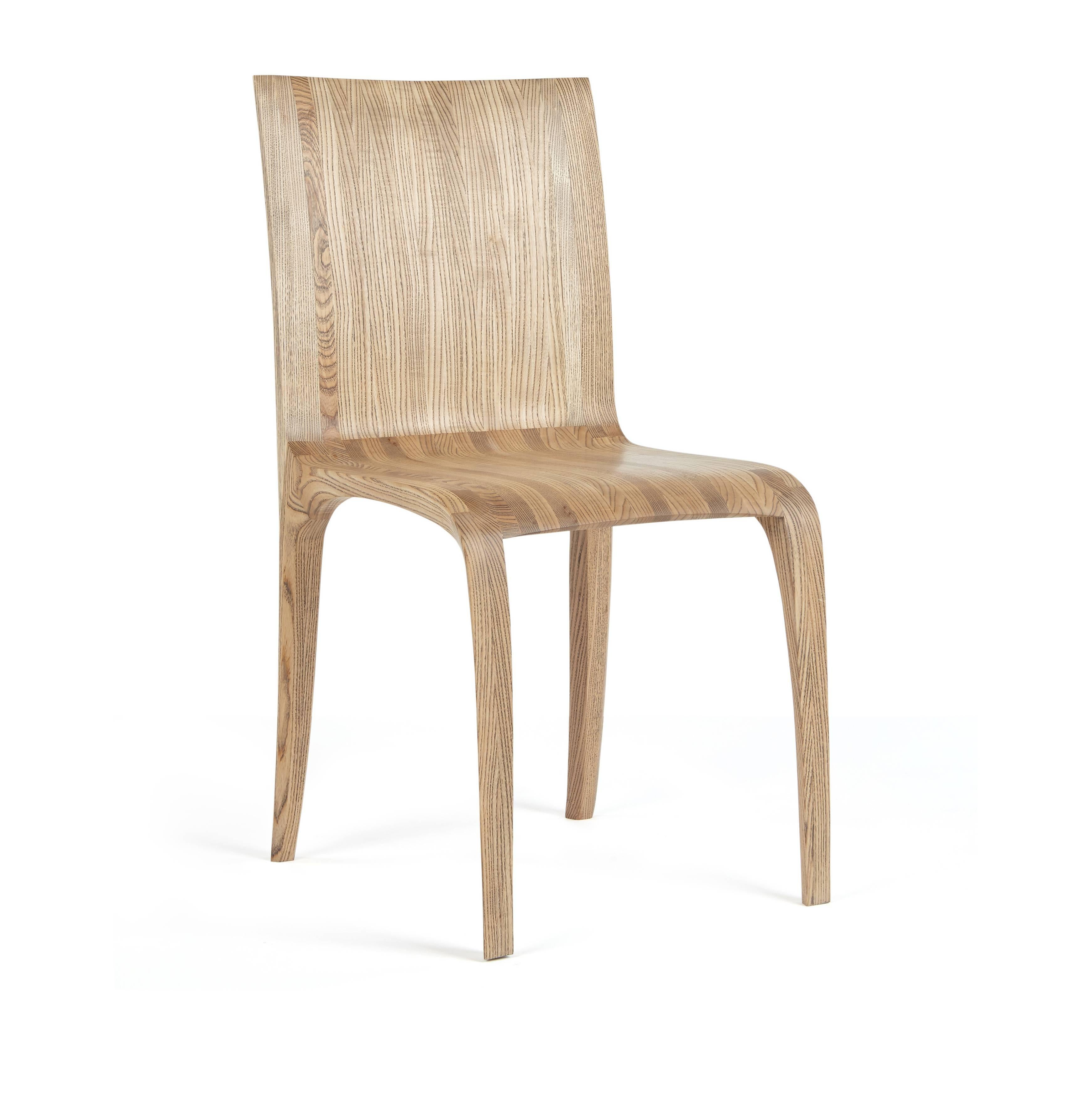 Modern Award winning rippled, ash hand-carved chairs. by Jonathan Field