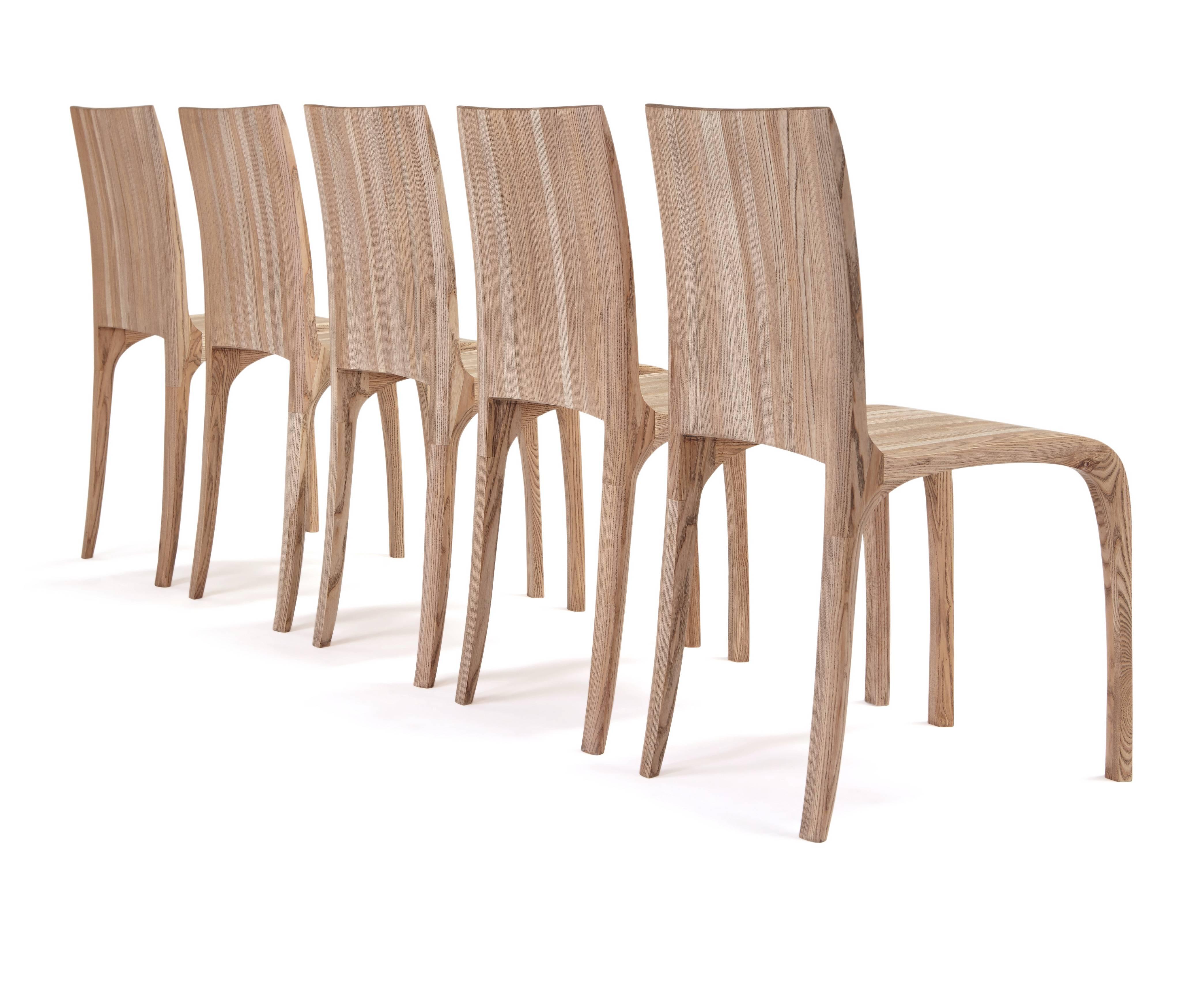 Award winning rippled, ash hand-carved chairs. by Jonathan Field 1