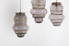 Contemporary Minor Flaws, Mouth Blown Glass Pendant with Brass Rings