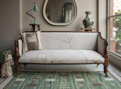 Late Regency Carved Mahogany Campaign Sofa
