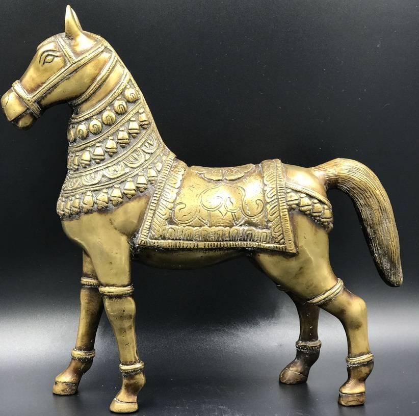 Antique, heavy horse made from brass, presumably in Spanish Andalusia.

It weights over 3000 g.
 