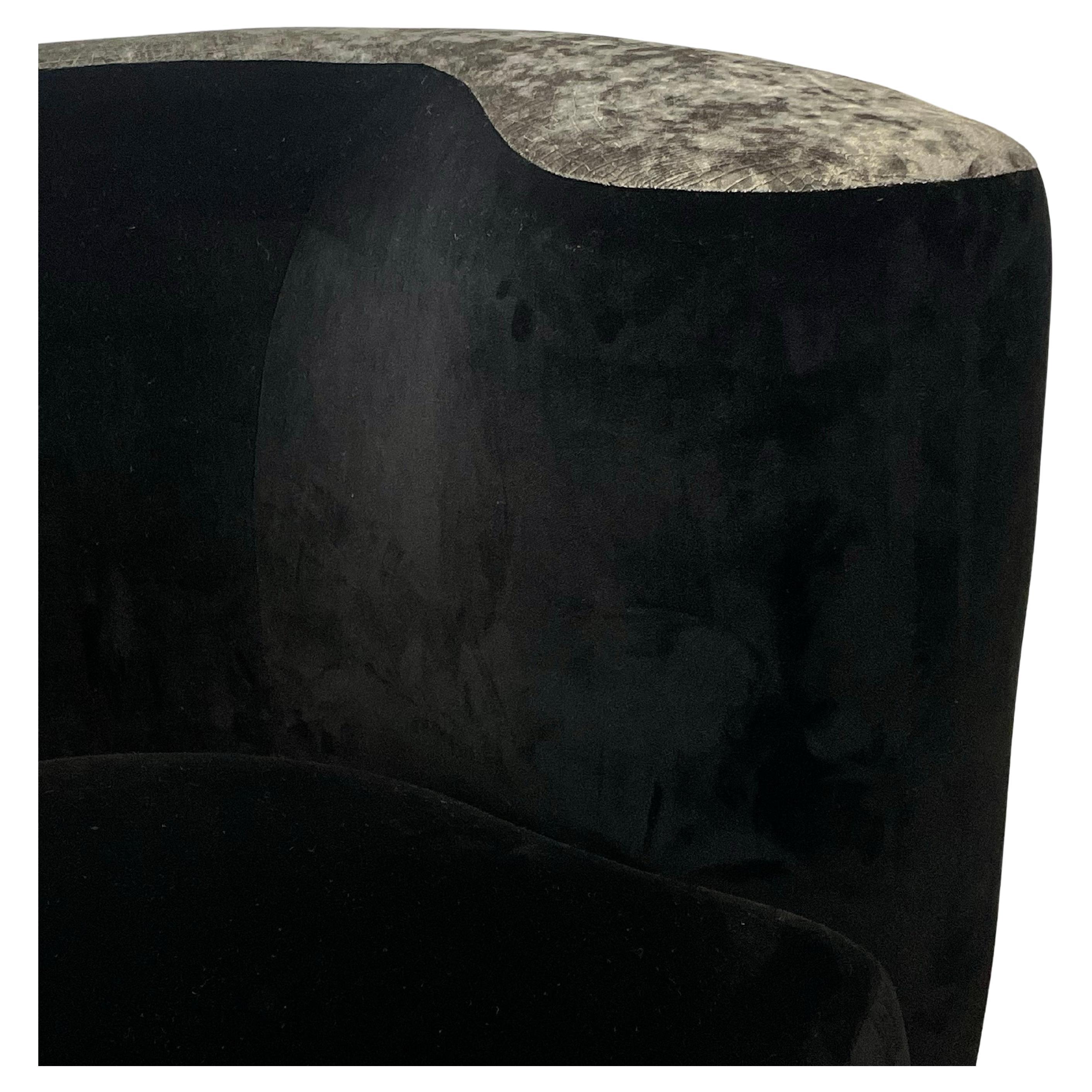 Vladimir Kagan chair, circa 1980. The original frame was recovered in lustrous black Pierre Frey Mohair with a silvered grey alligator embossed velvet detail on the arm.